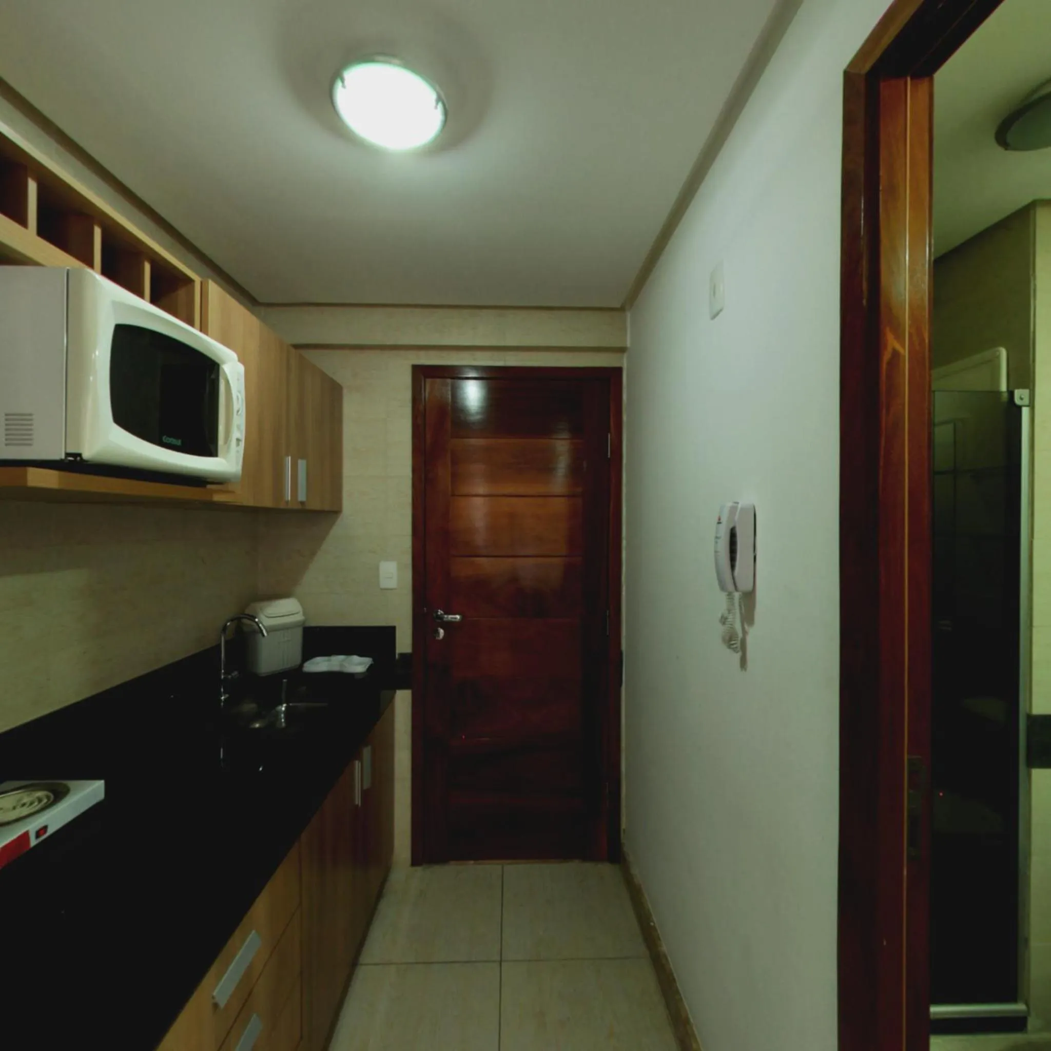 Kitchen or kitchenette in Flat Mar do Cabo Branco Residence