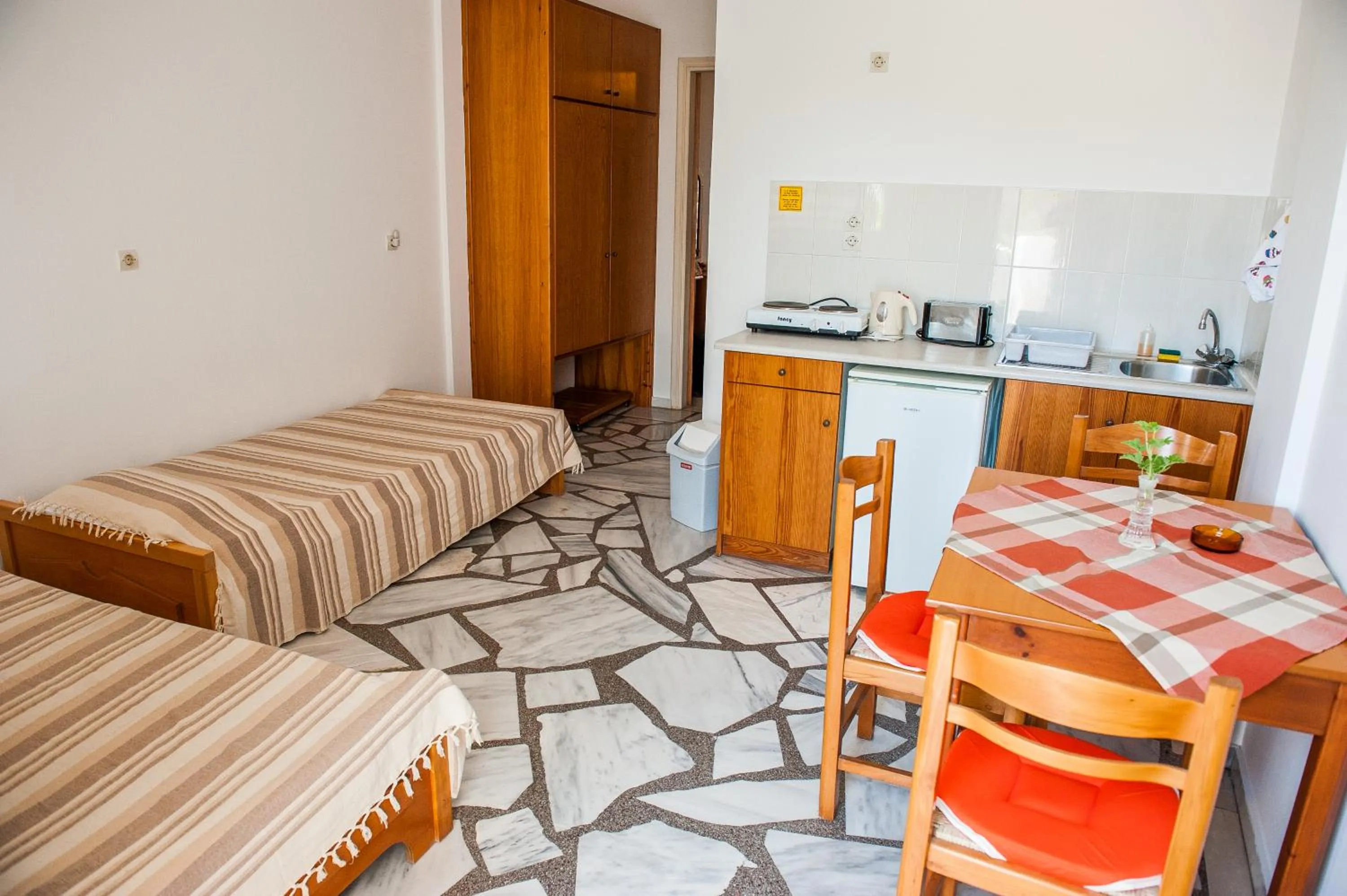 Photo of the whole room, Bed in Ilios and Irene