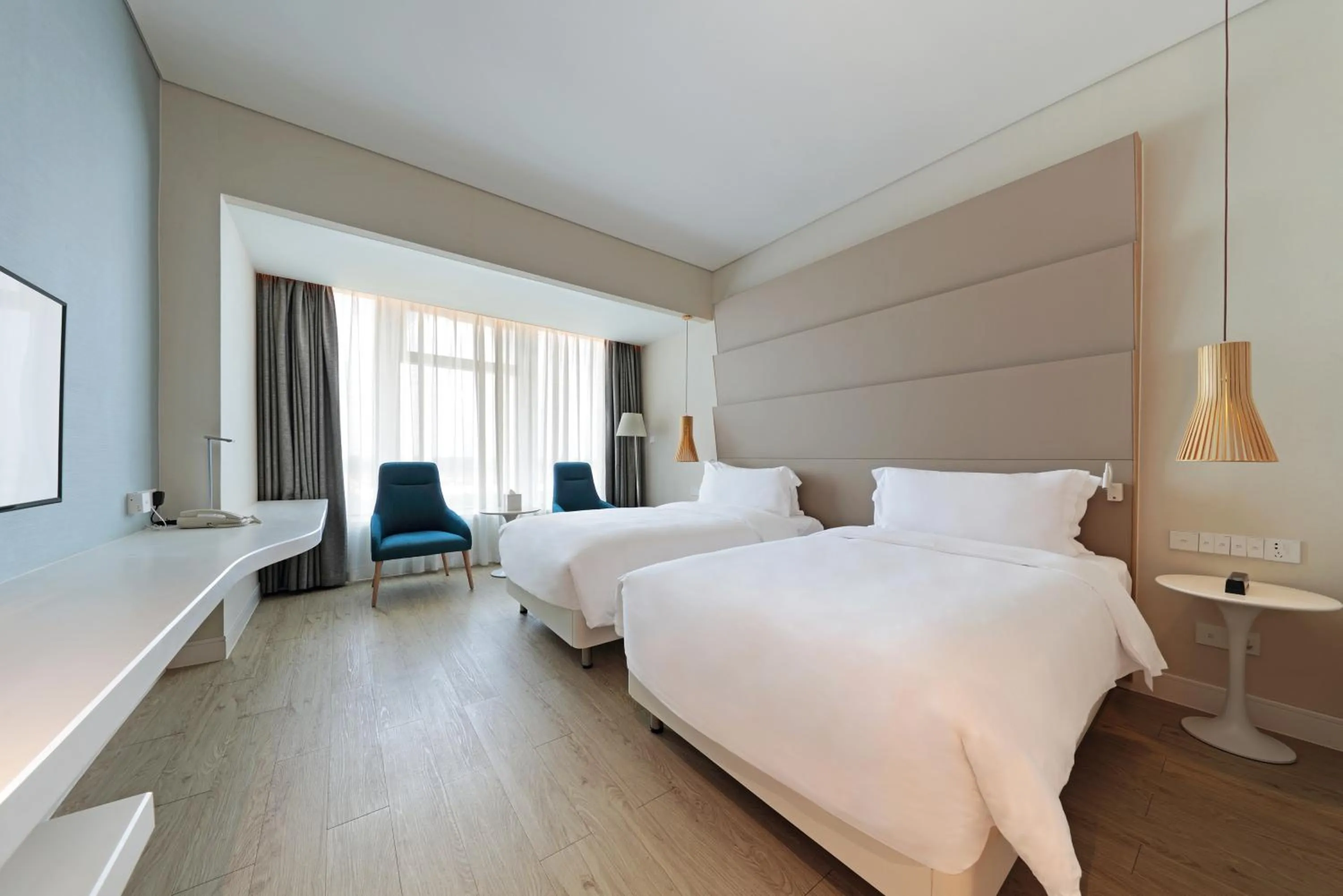 Bed in Haikou Meilan International Airport Hotel
