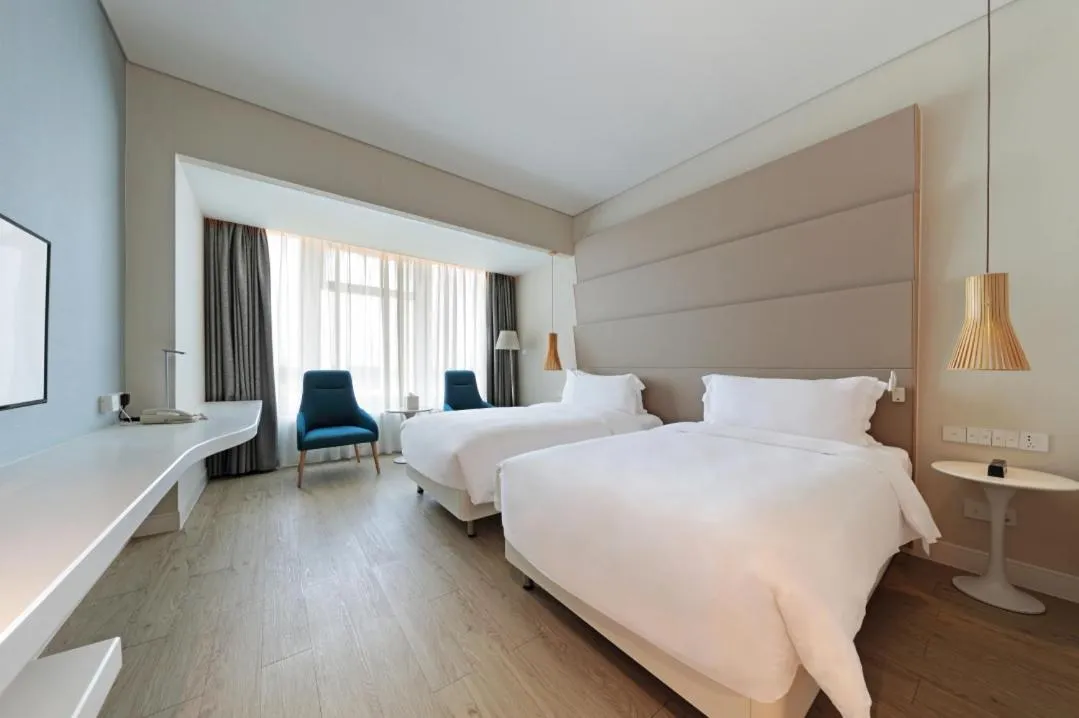 Bed in Haikou Meilan International Airport Hotel