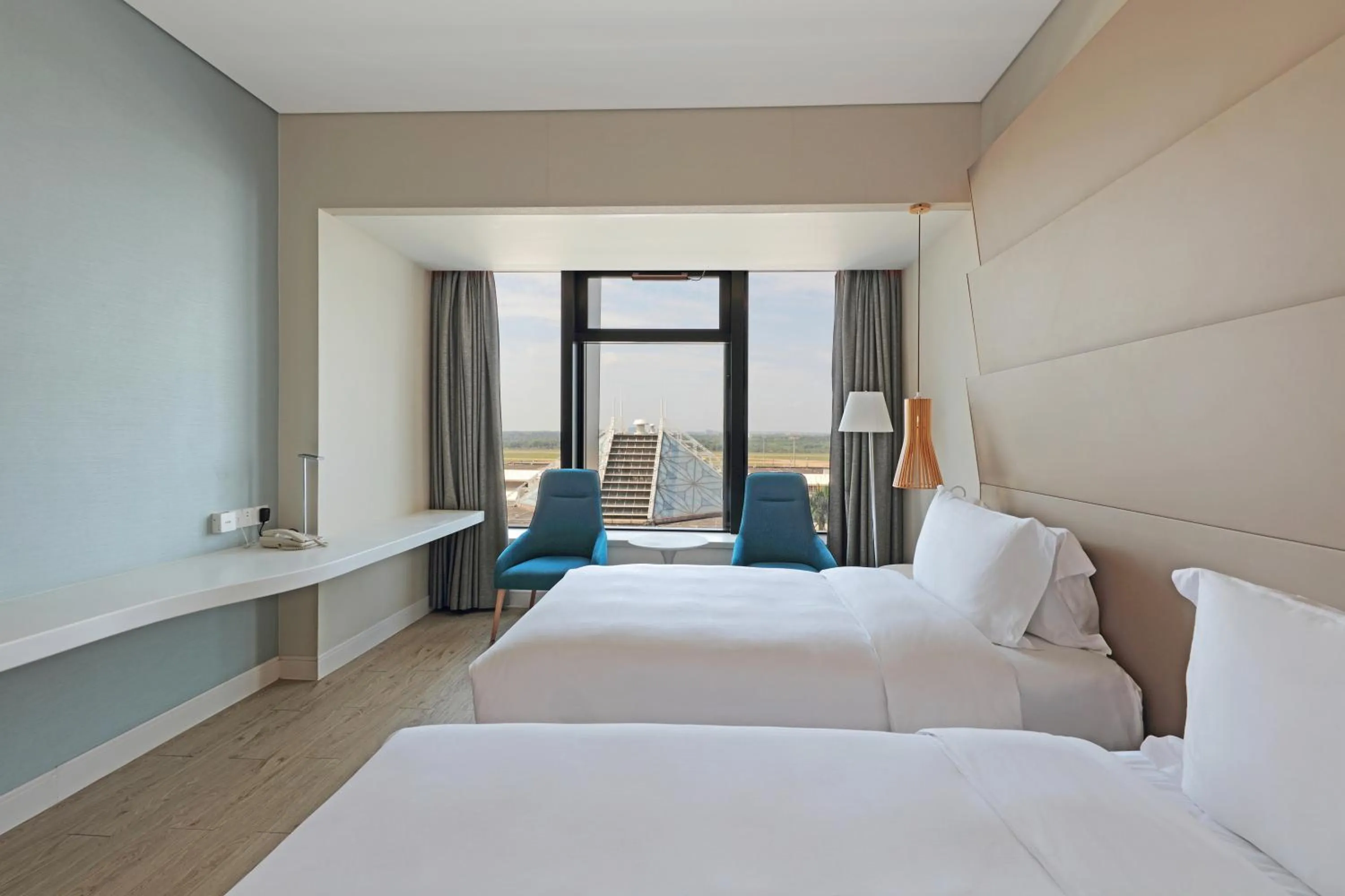 Bed in Haikou Meilan International Airport Hotel