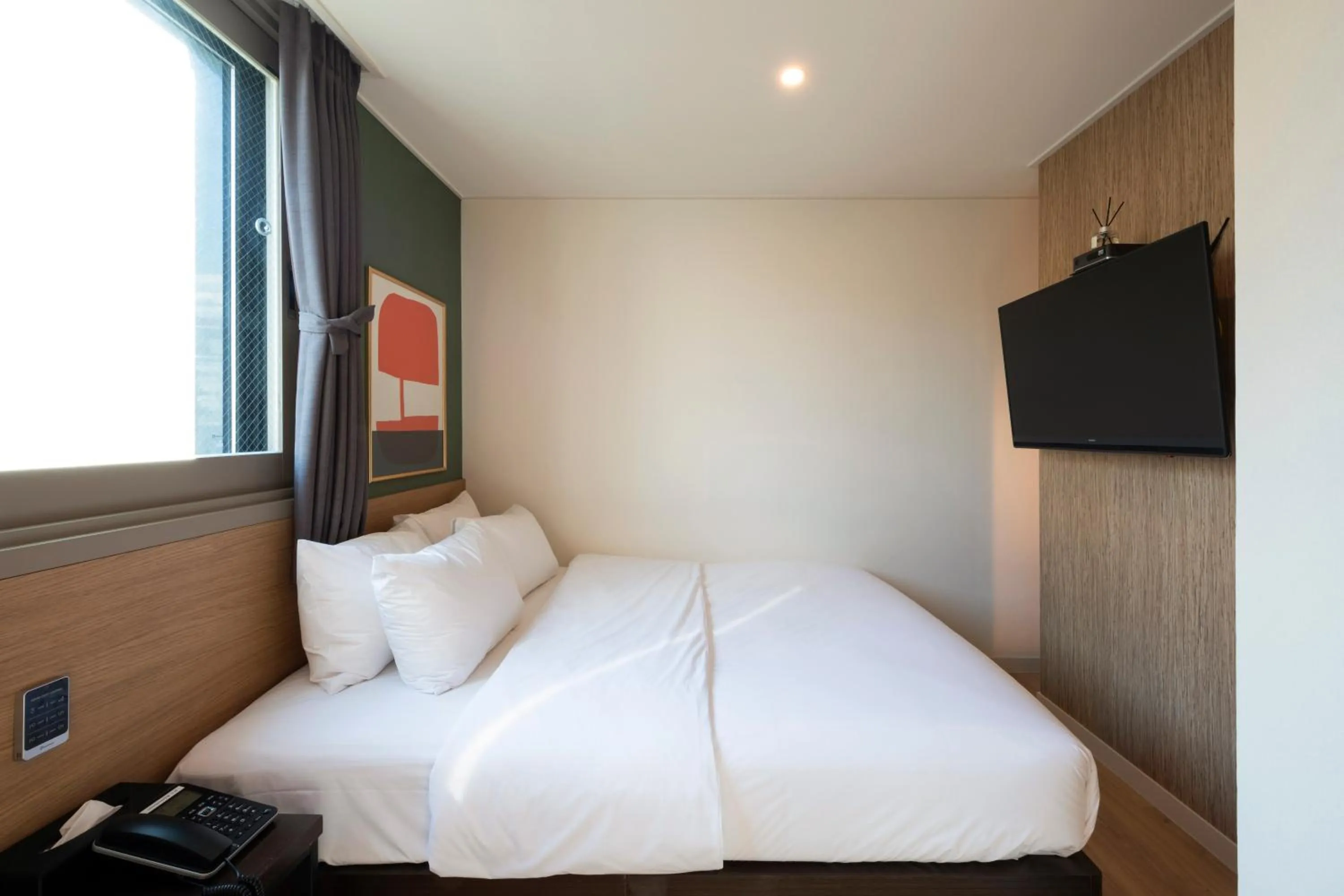 Bed in No. 25 Signature Hotel Daecheong