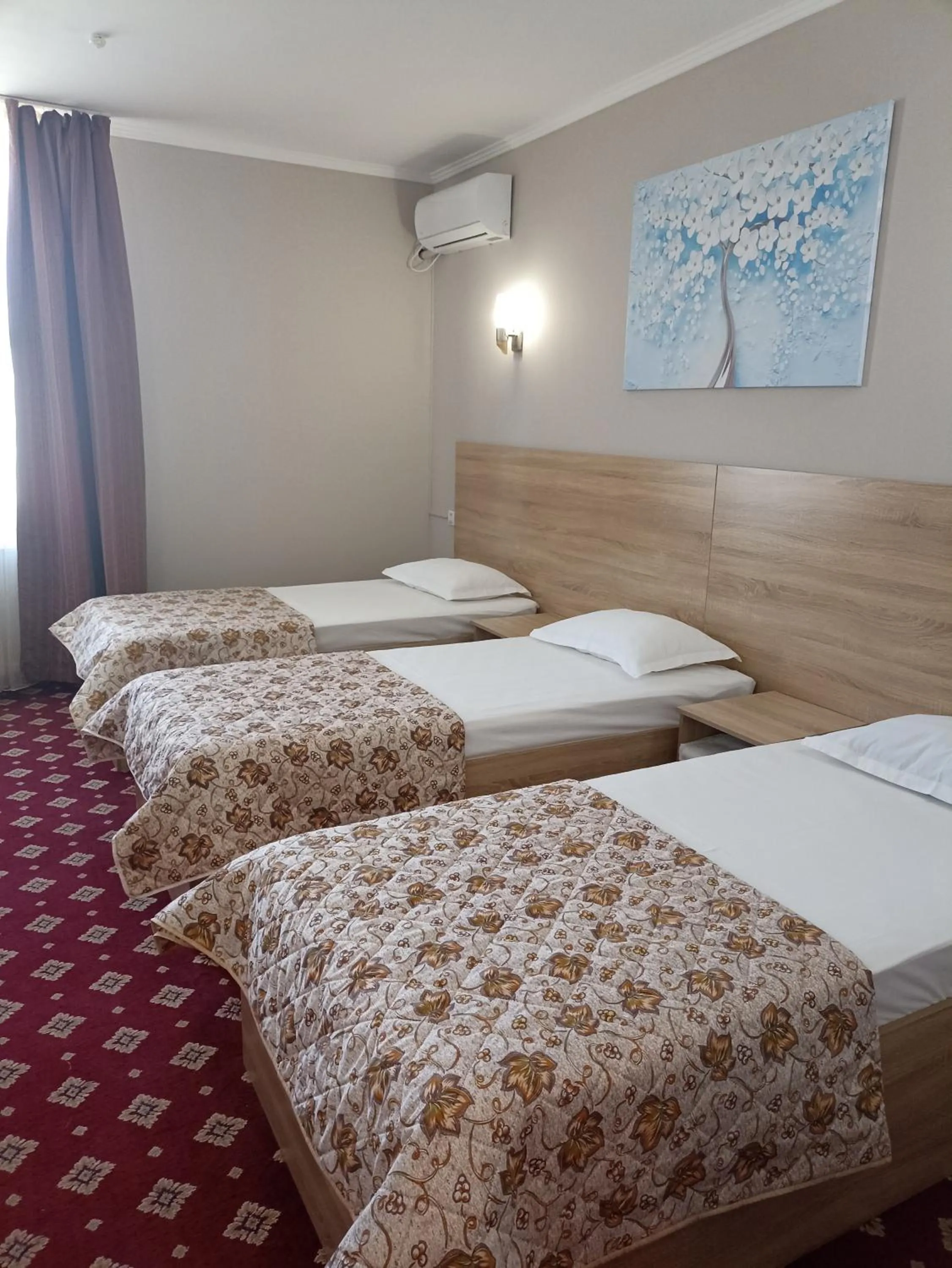 Bed in Silk Way Hotel