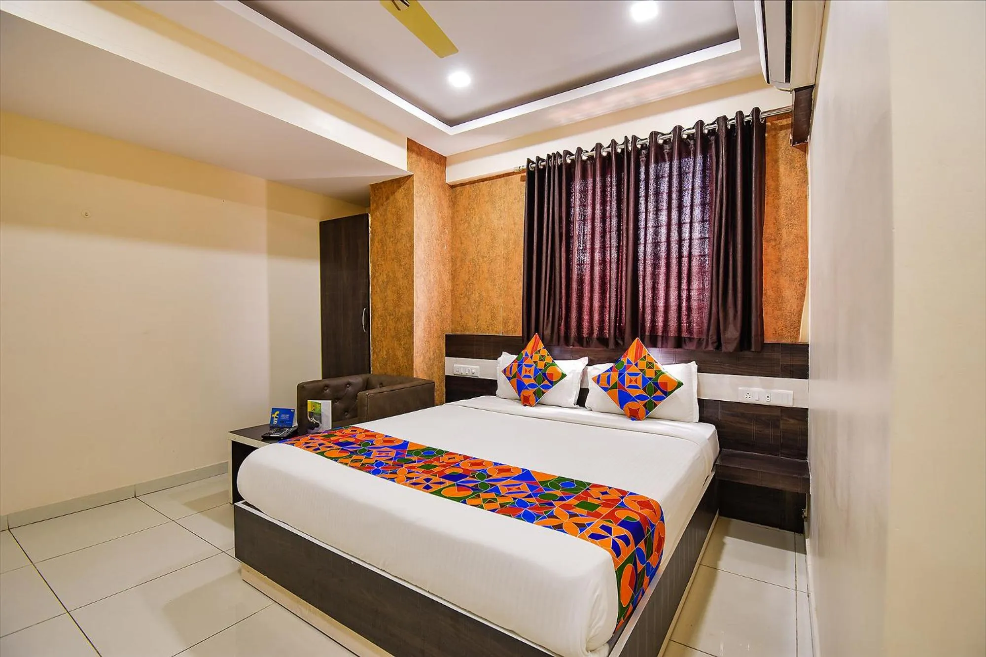 Bed in FabHotel Rotano Suites - Yelahanka