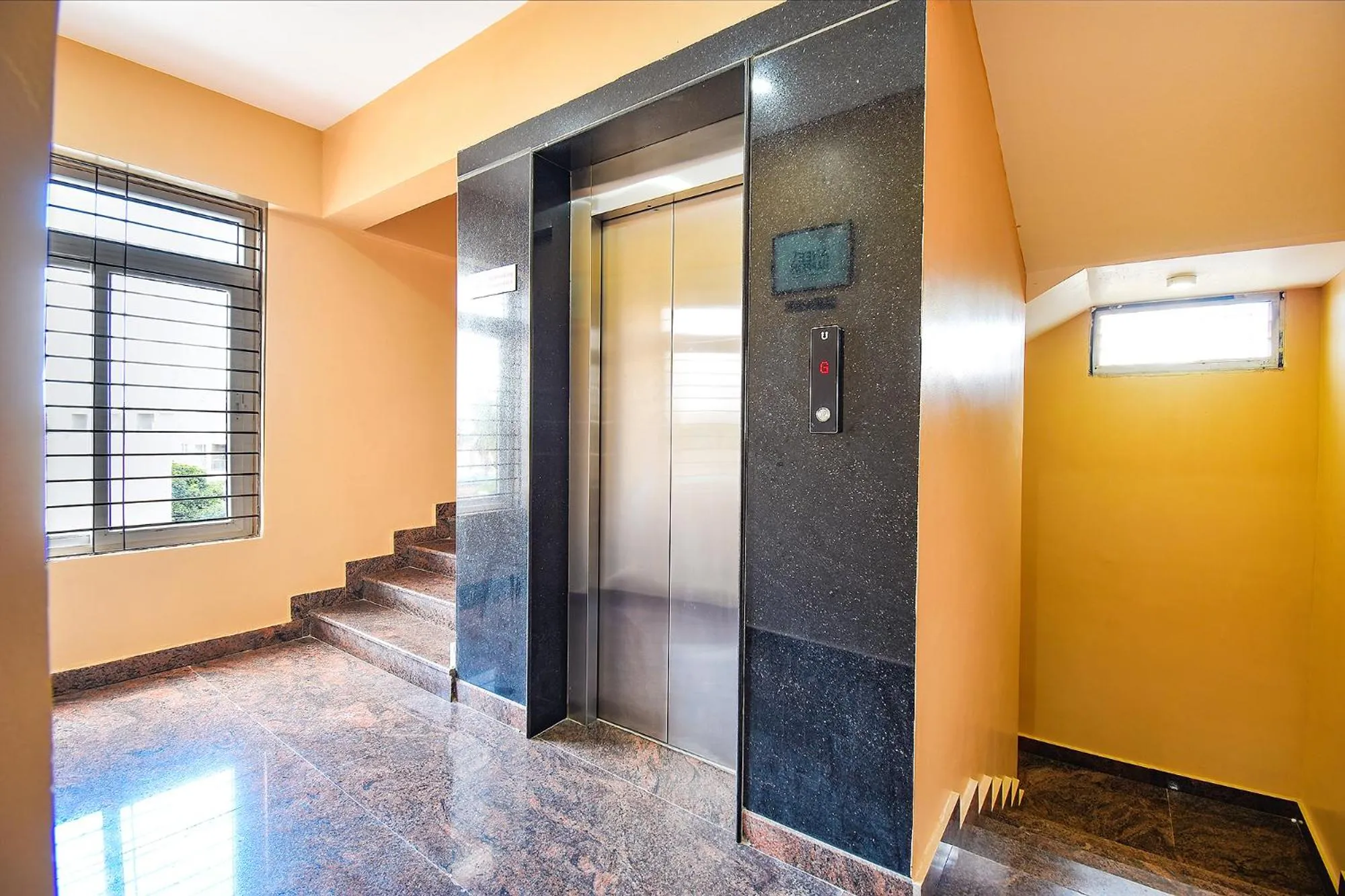 Lobby or reception in FabHotel Rotano Suites - Yelahanka