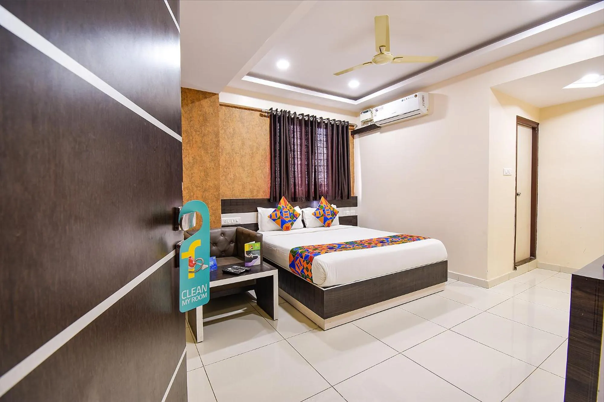 Bed in FabHotel Rotano Suites - Yelahanka