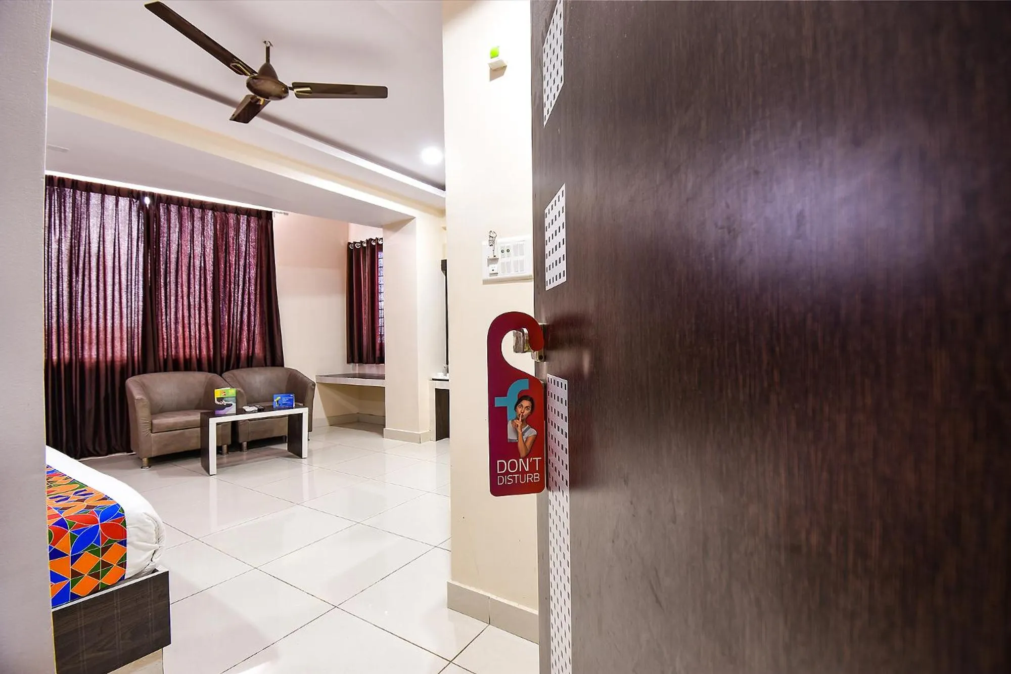 Bed in FabHotel Rotano Suites - Yelahanka