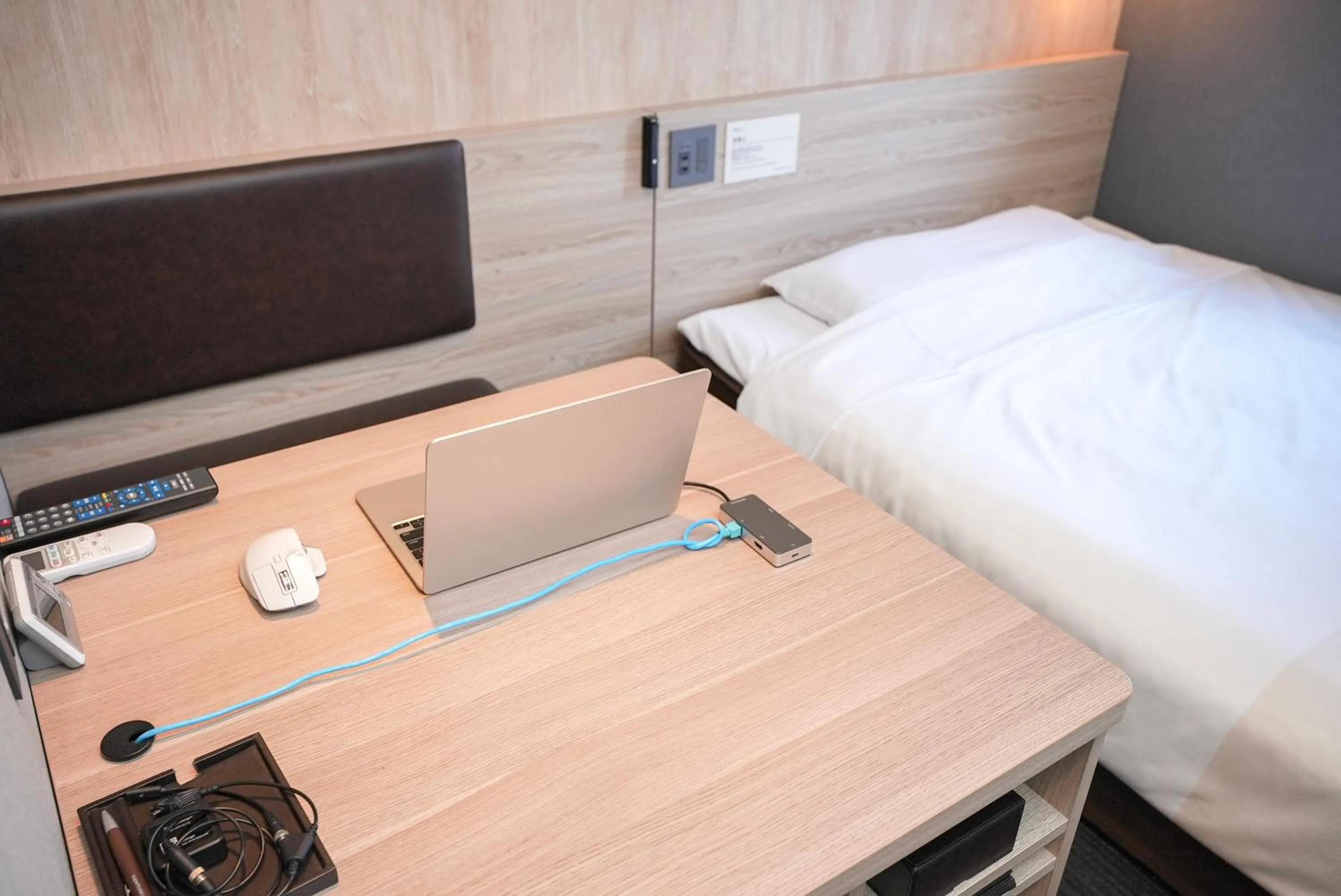 Bed in Super Hotel Hiroshima