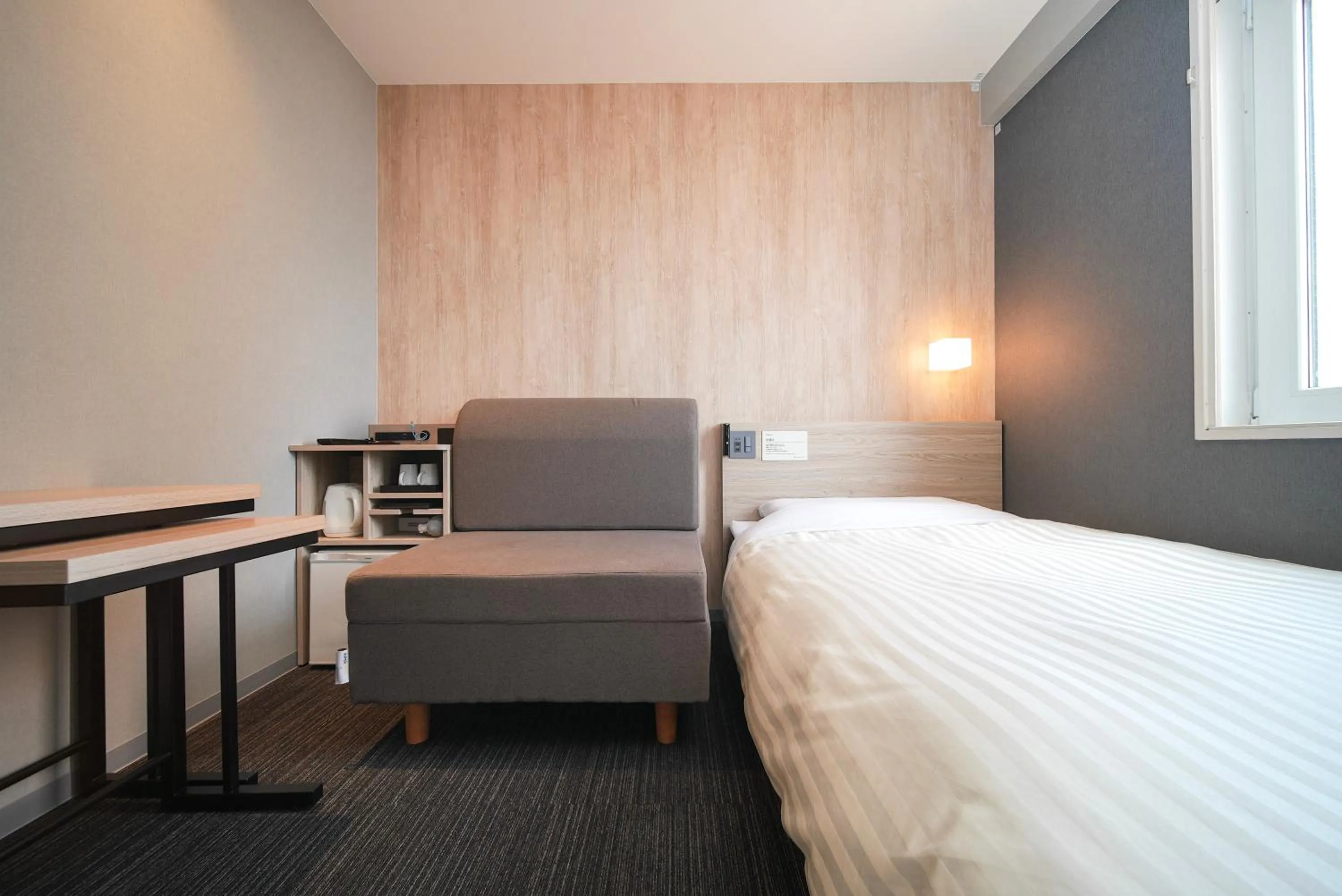 Bed in Super Hotel Hiroshima