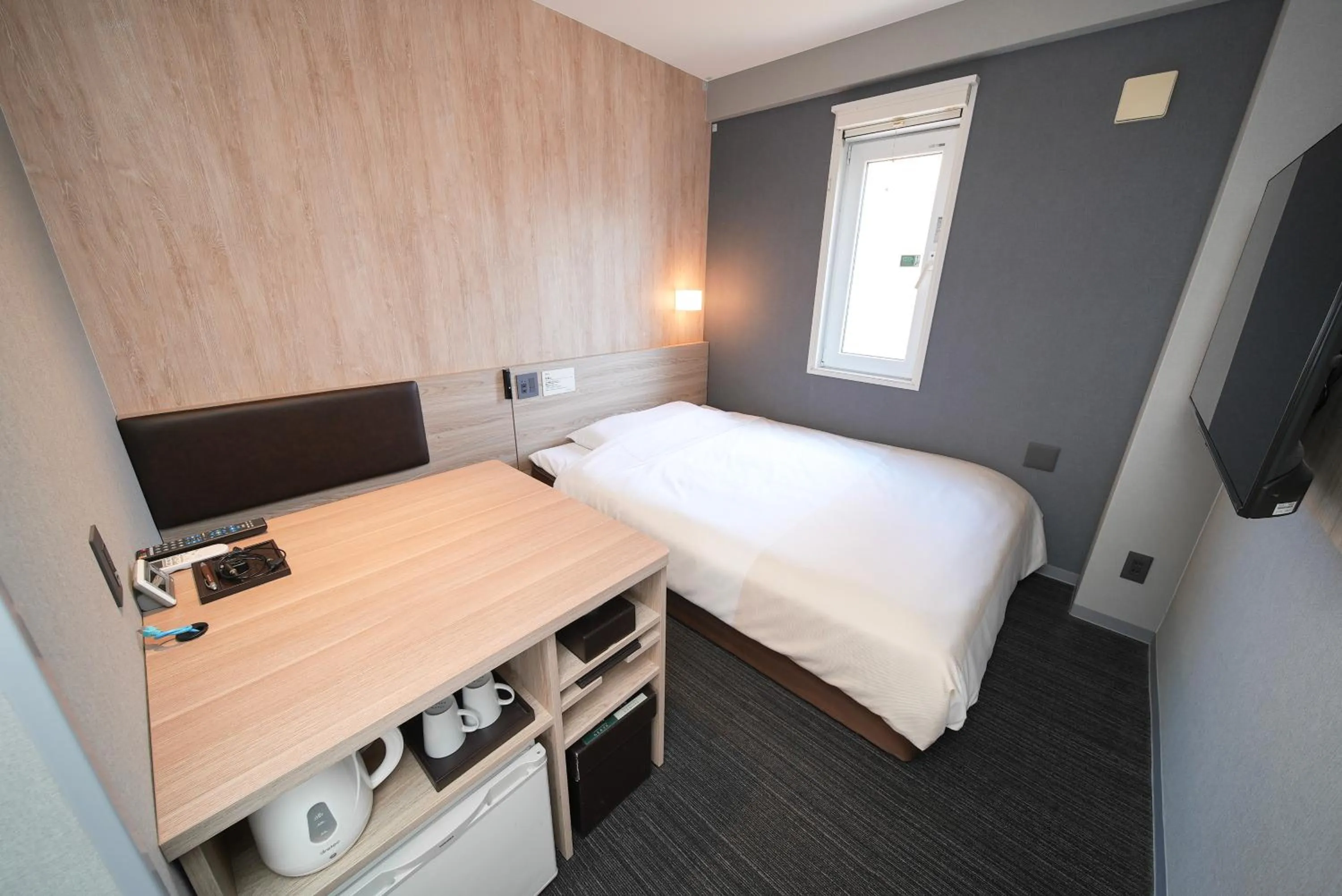 Bed in Super Hotel Hiroshima