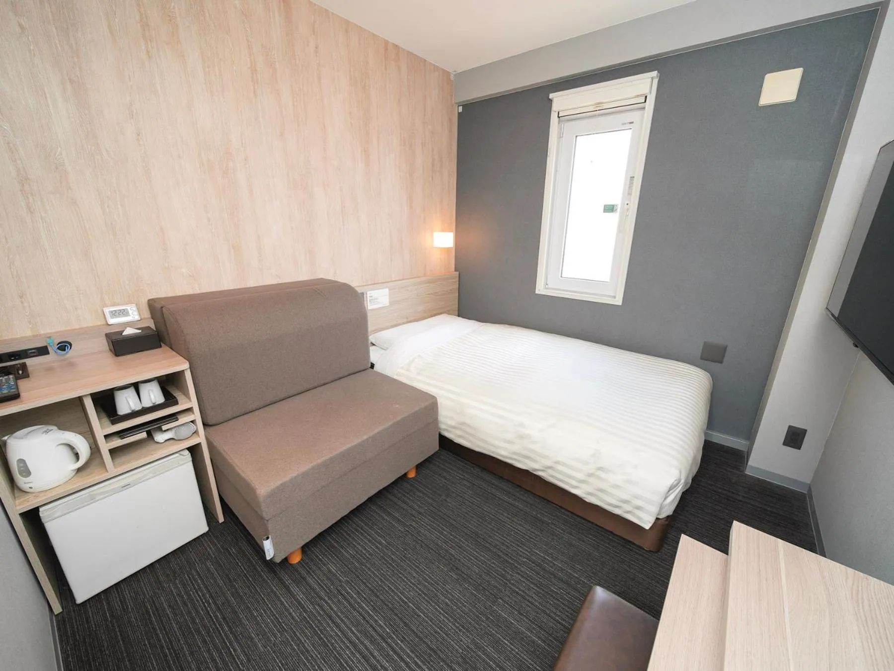 Bed in Super Hotel Hiroshima