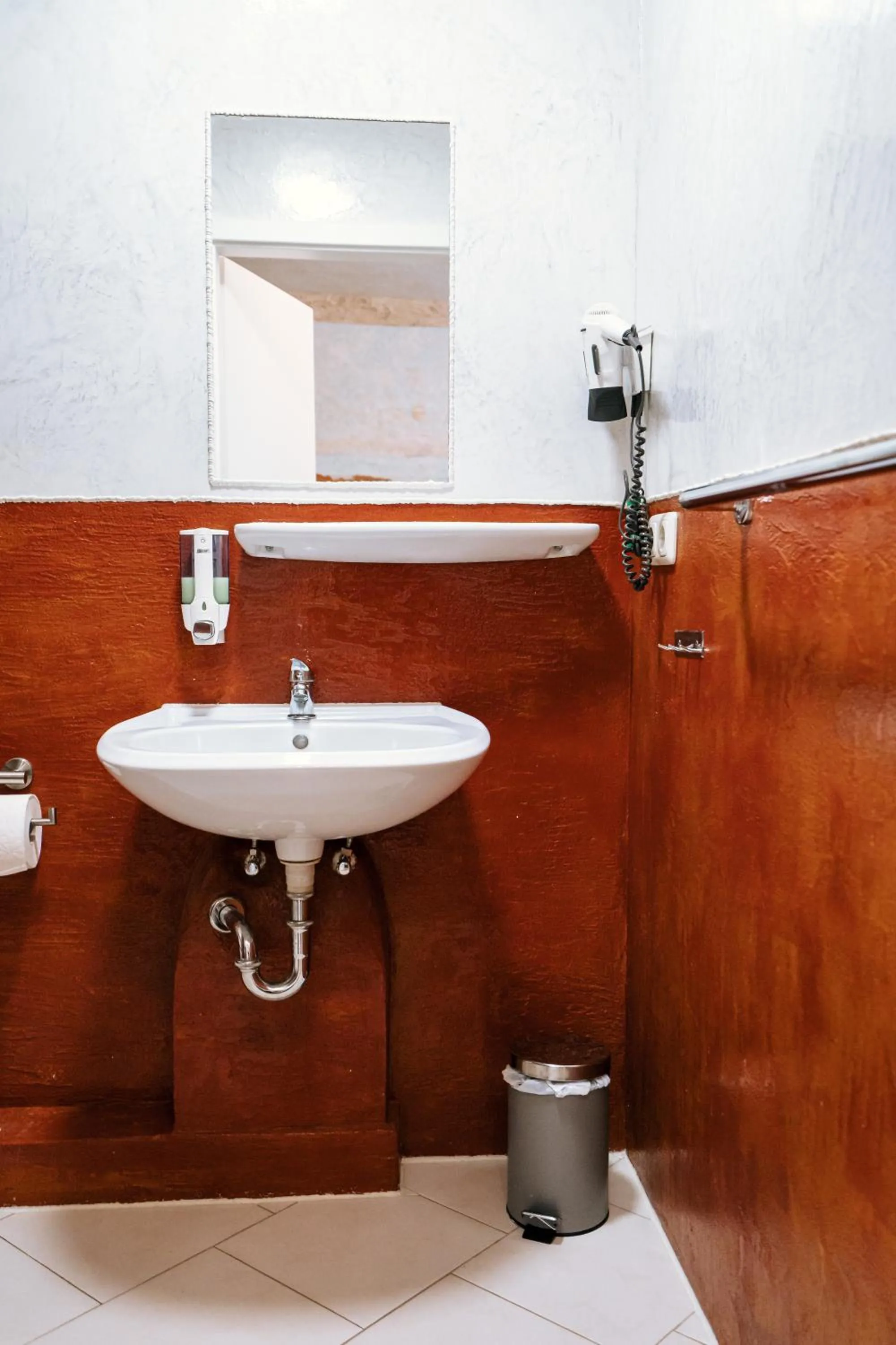 Toilet in Dill Hotel