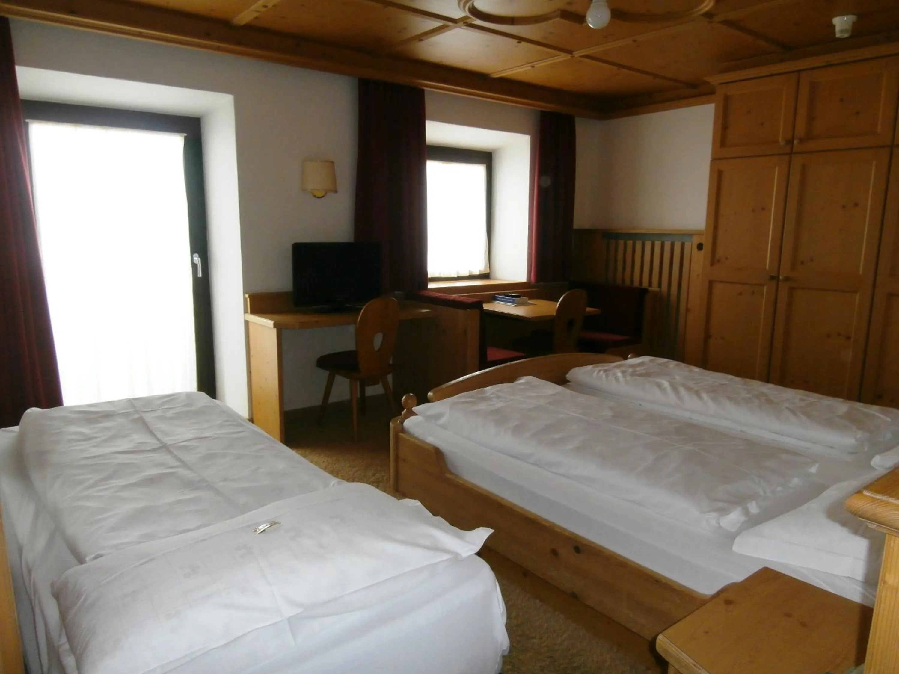 Bed in Piccolo Hotel Gurschler