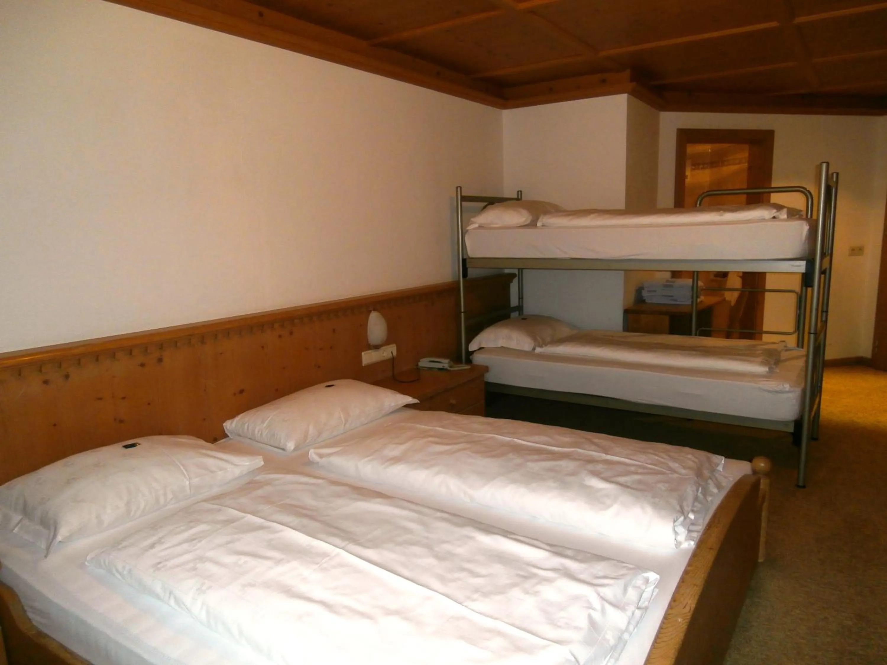 Bed in Piccolo Hotel Gurschler