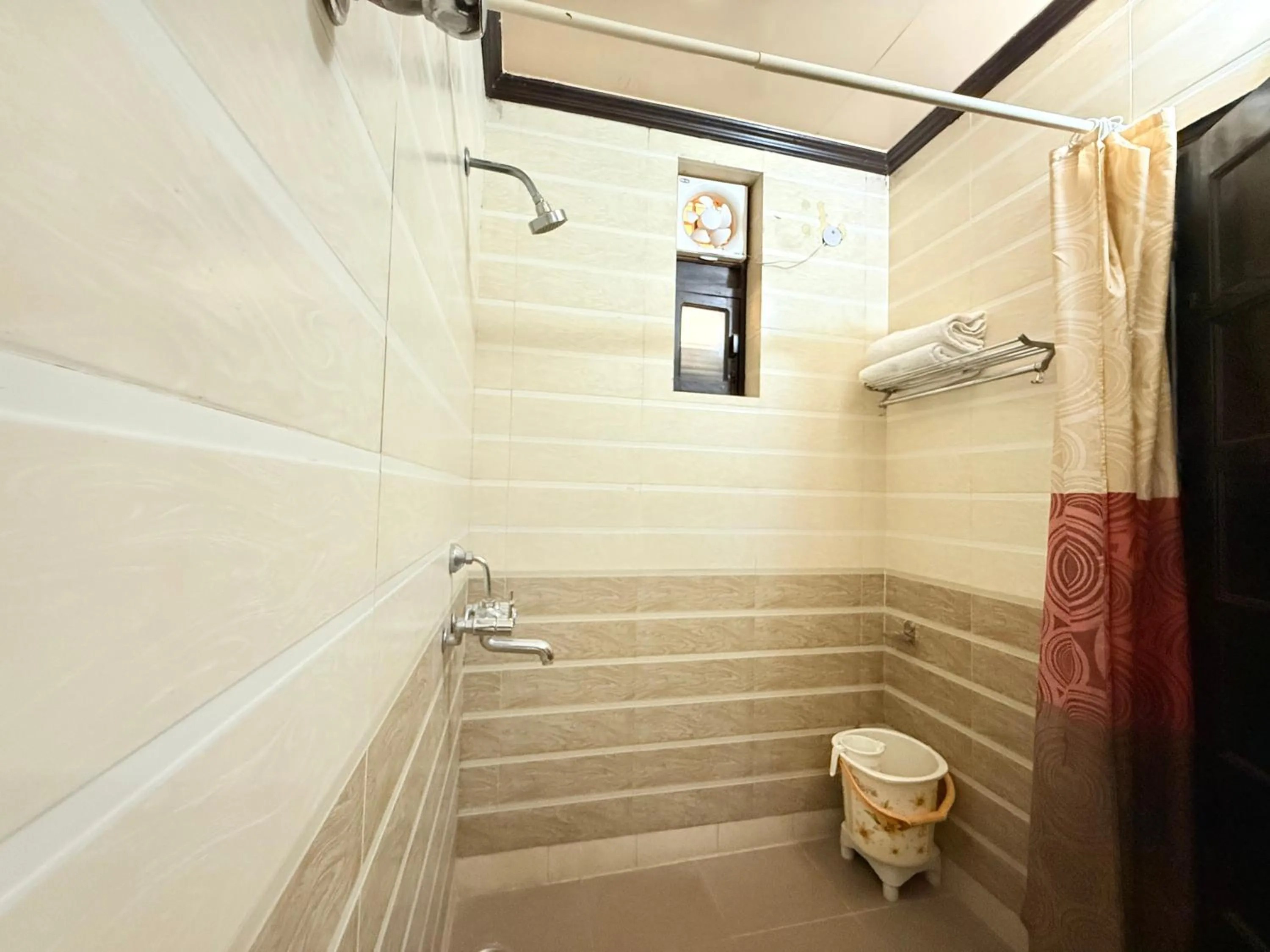 Shower in ECKO Kasang Regency Hill Resort