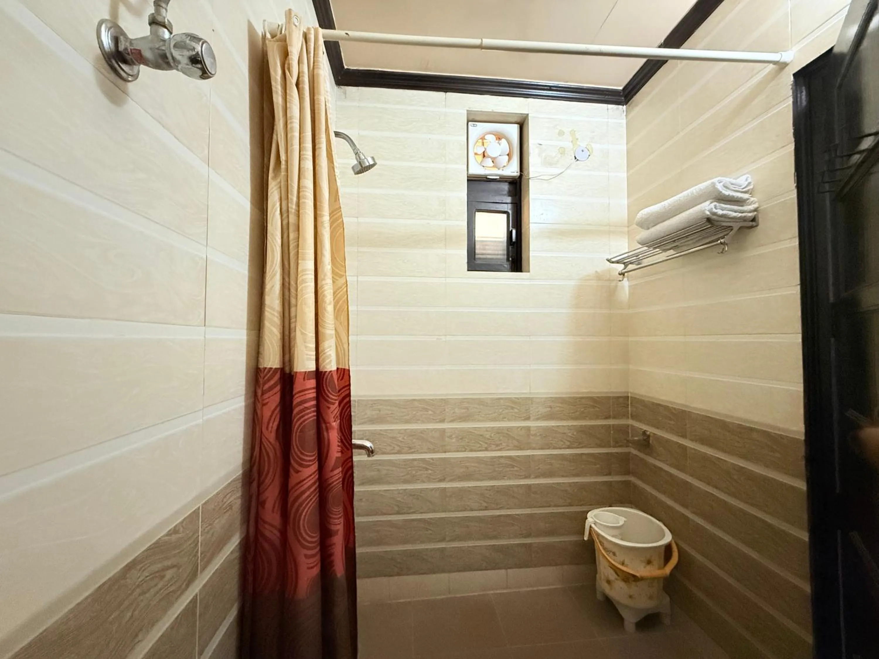 Shower in ECKO Kasang Regency Hill Resort