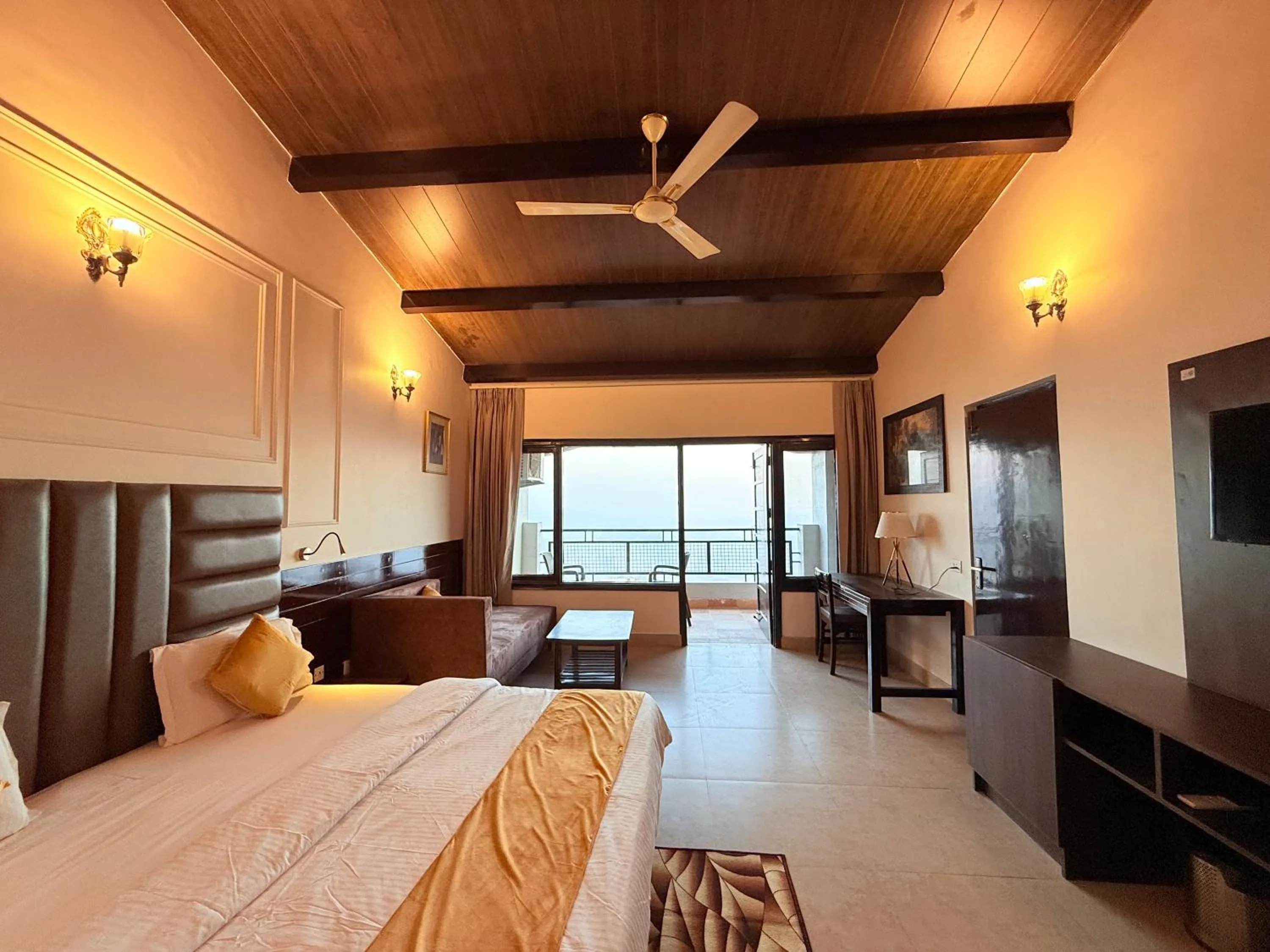 Photo of the whole room, Bed in ECKO Kasang Regency Hill Resort