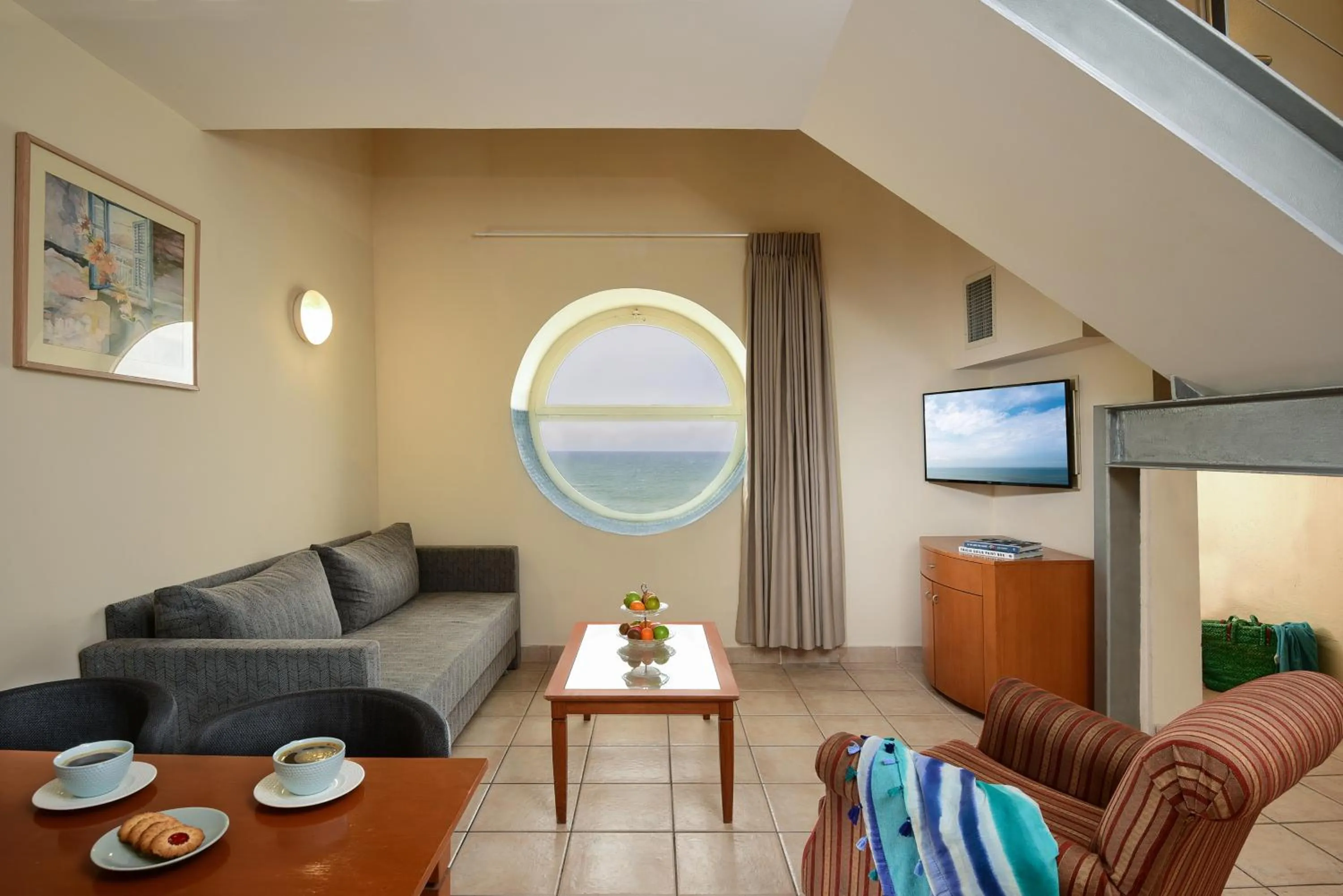 Living room in Arena Hotel by the Beach