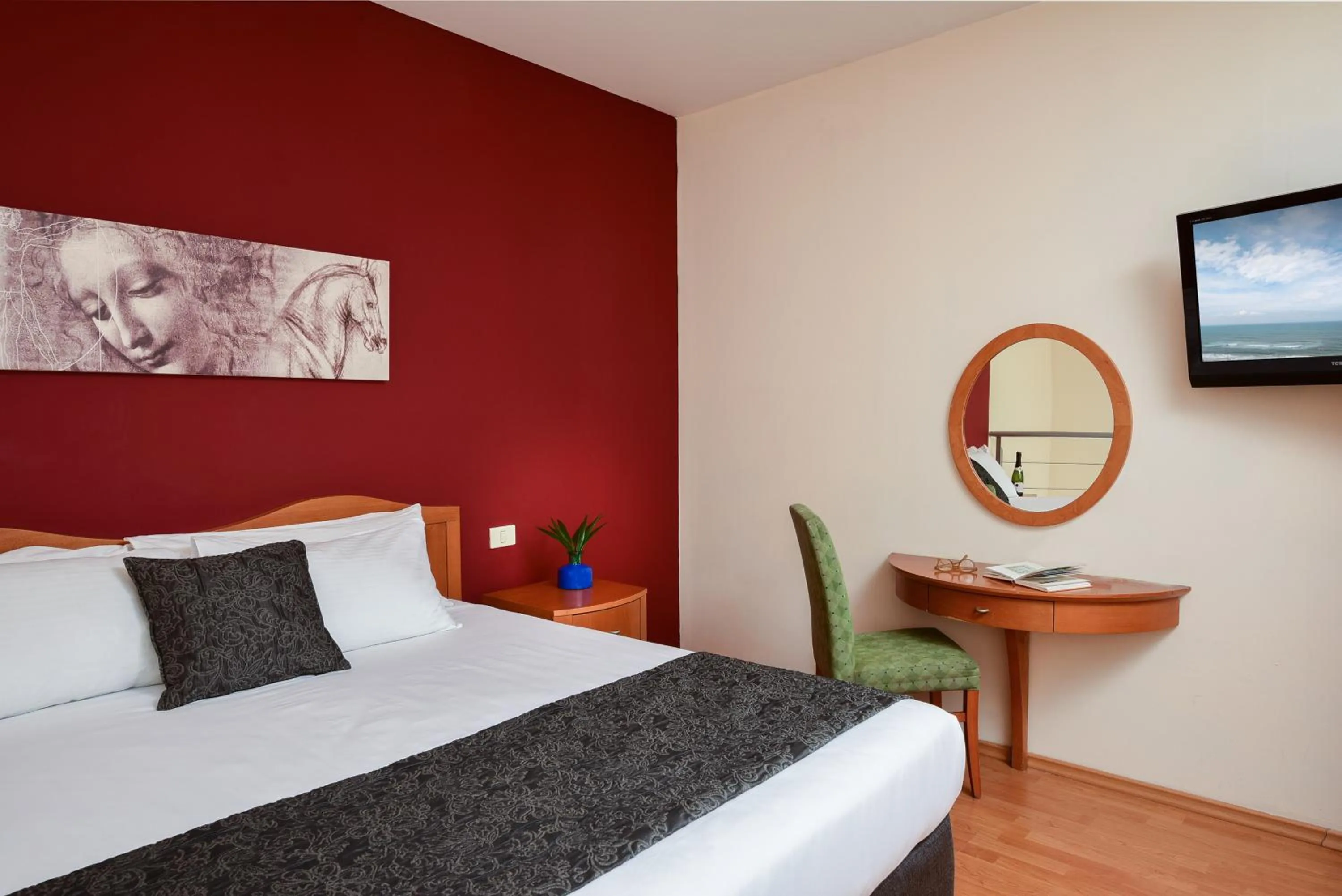 Bedroom in Arena Hotel by the Beach