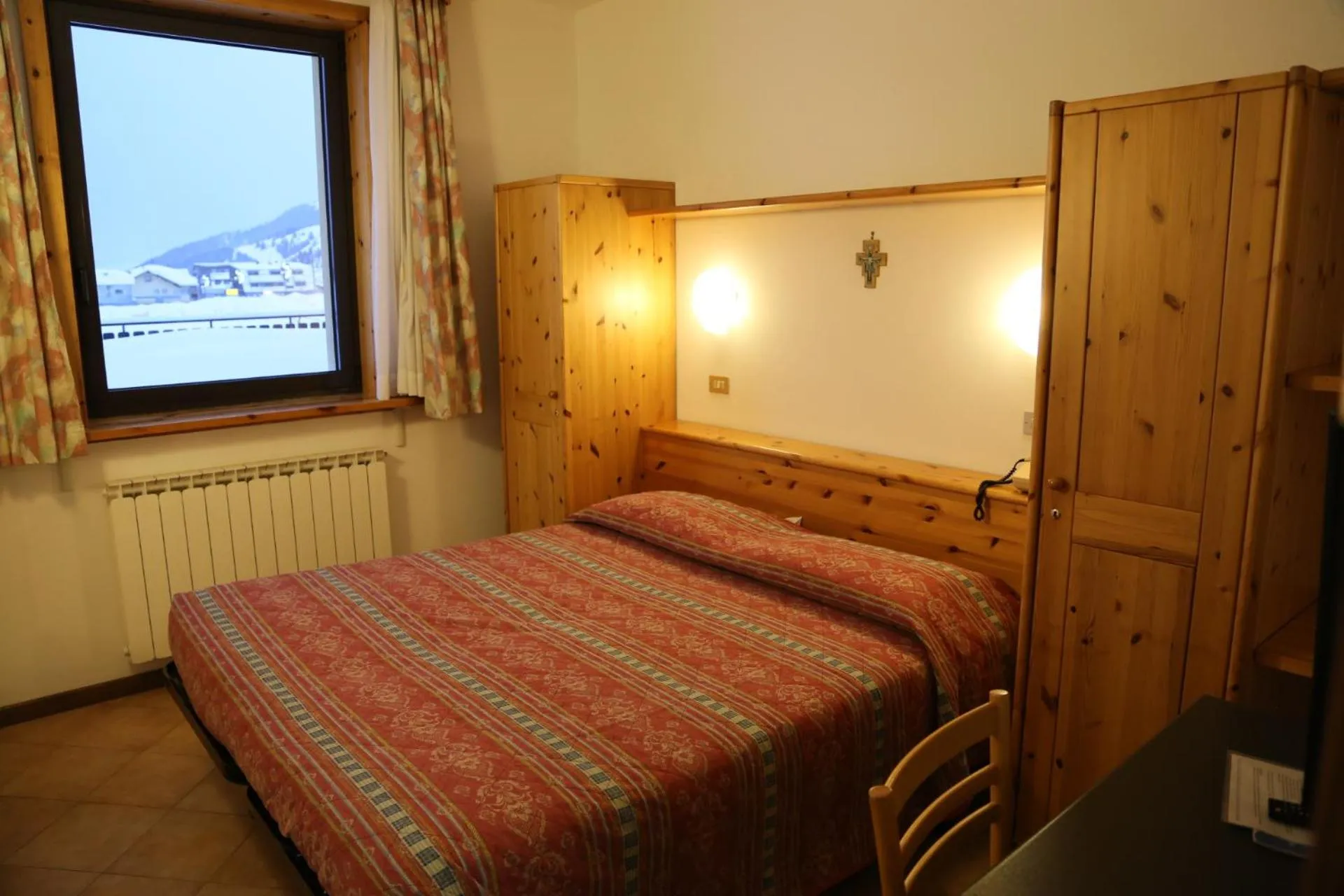 Bed in Hotel Dolomiti