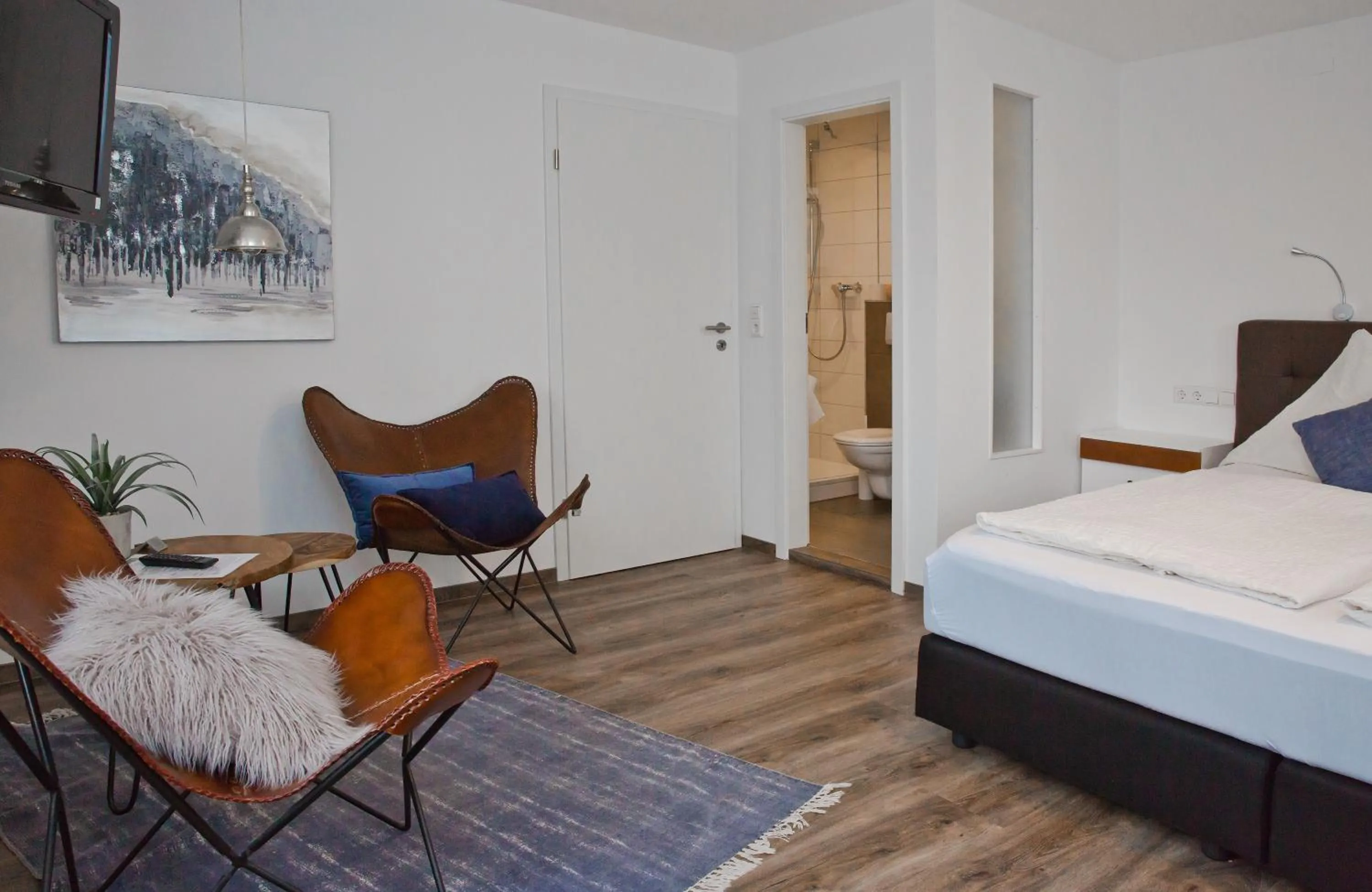 Seating area, Bed in Pension Kramer