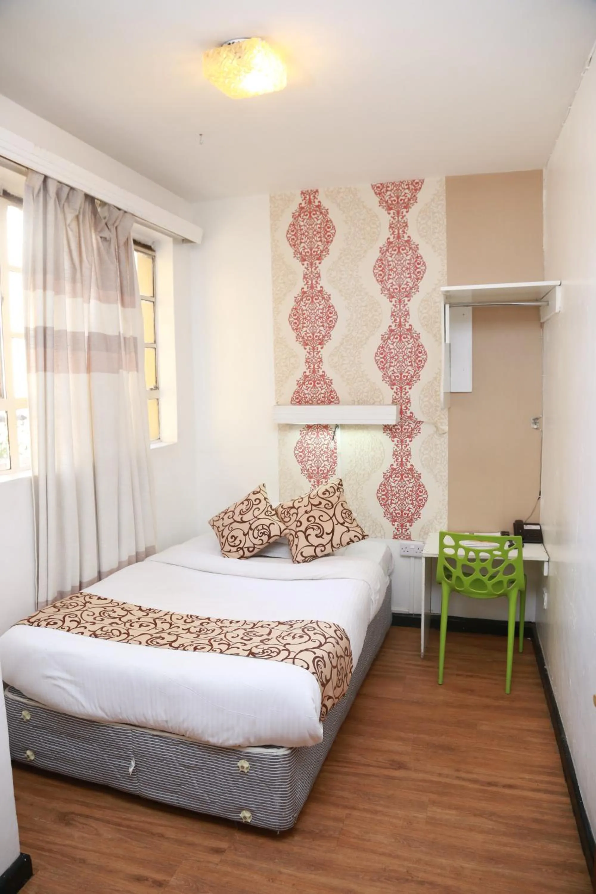 Bed in Hotel Embassy