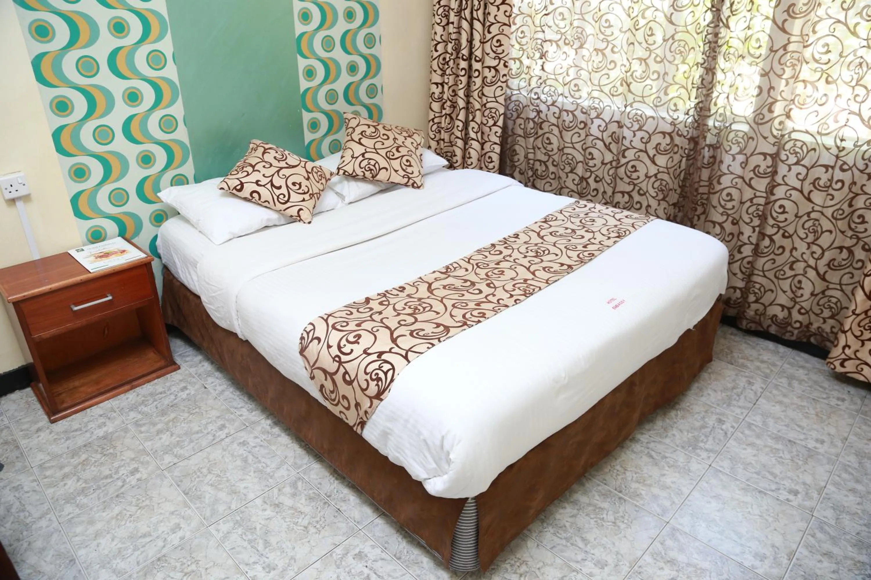 Bed in Hotel Embassy