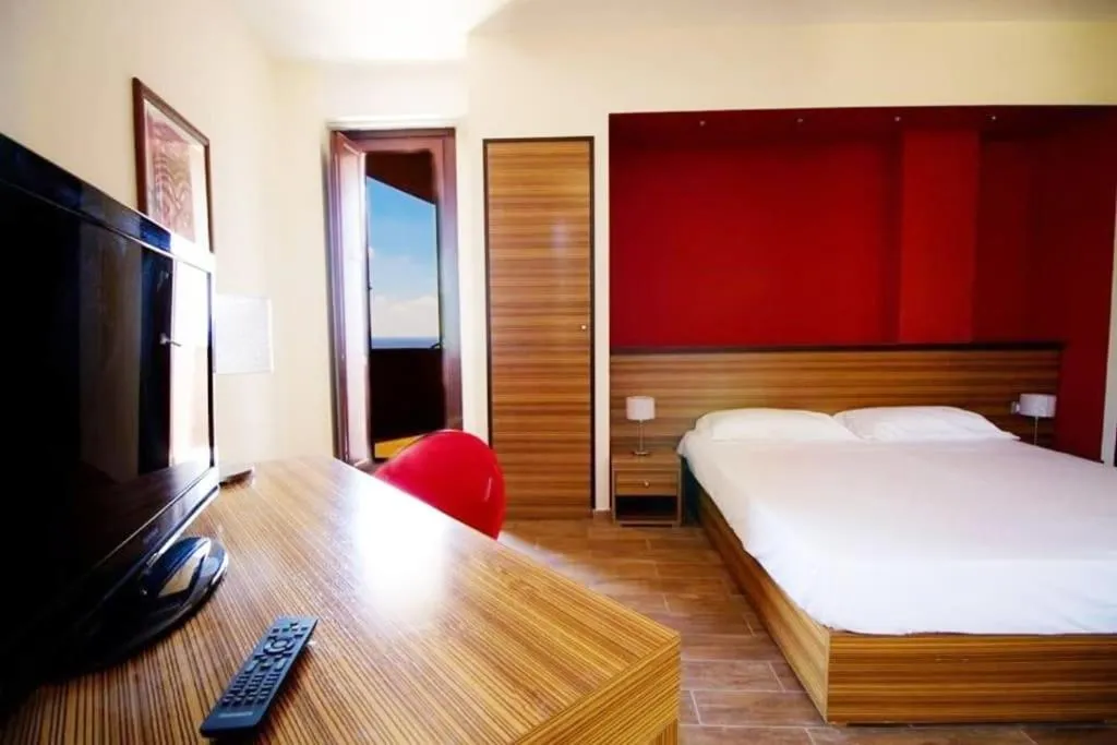 Bed in Nuraghe Apartments