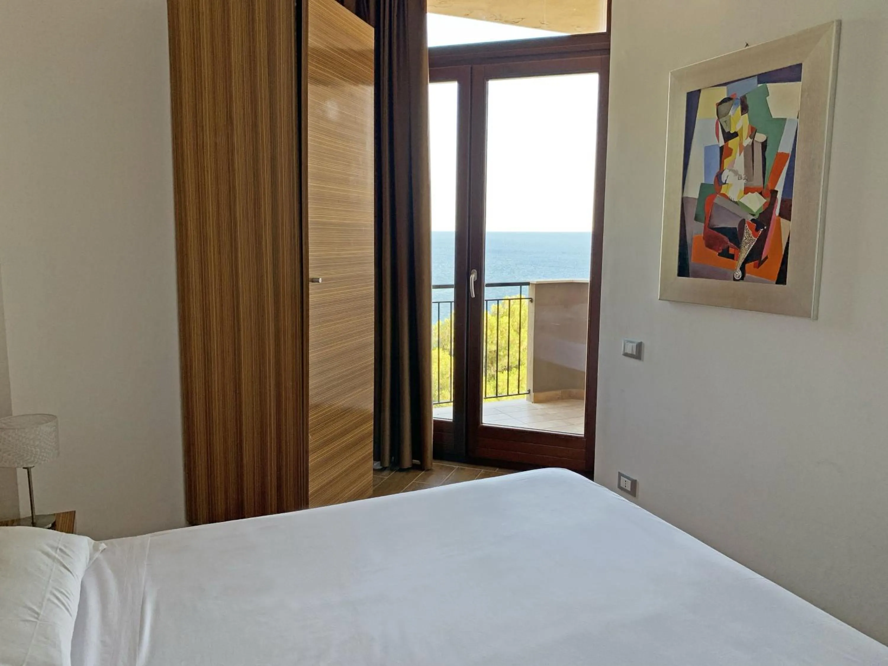 Bed in Nuraghe Apartments