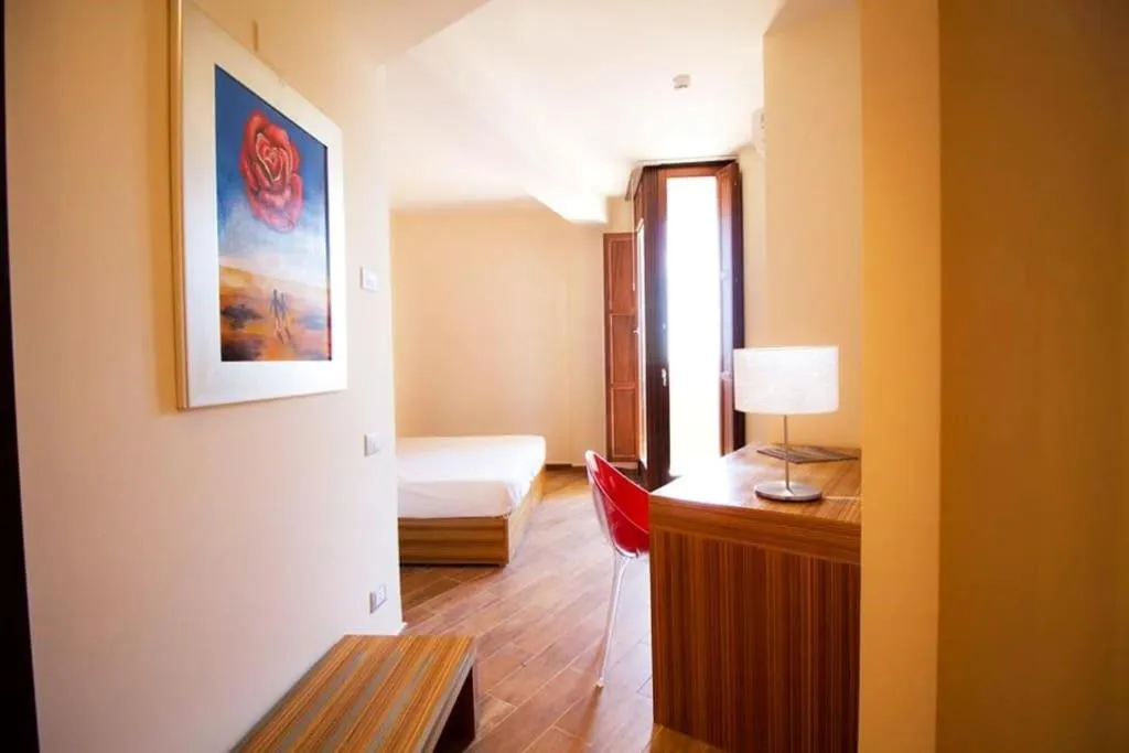 Bed in Nuraghe Apartments