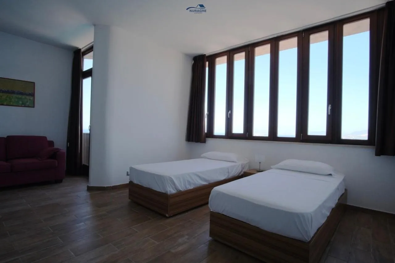 Bedroom, Bed in Nuraghe Apartments