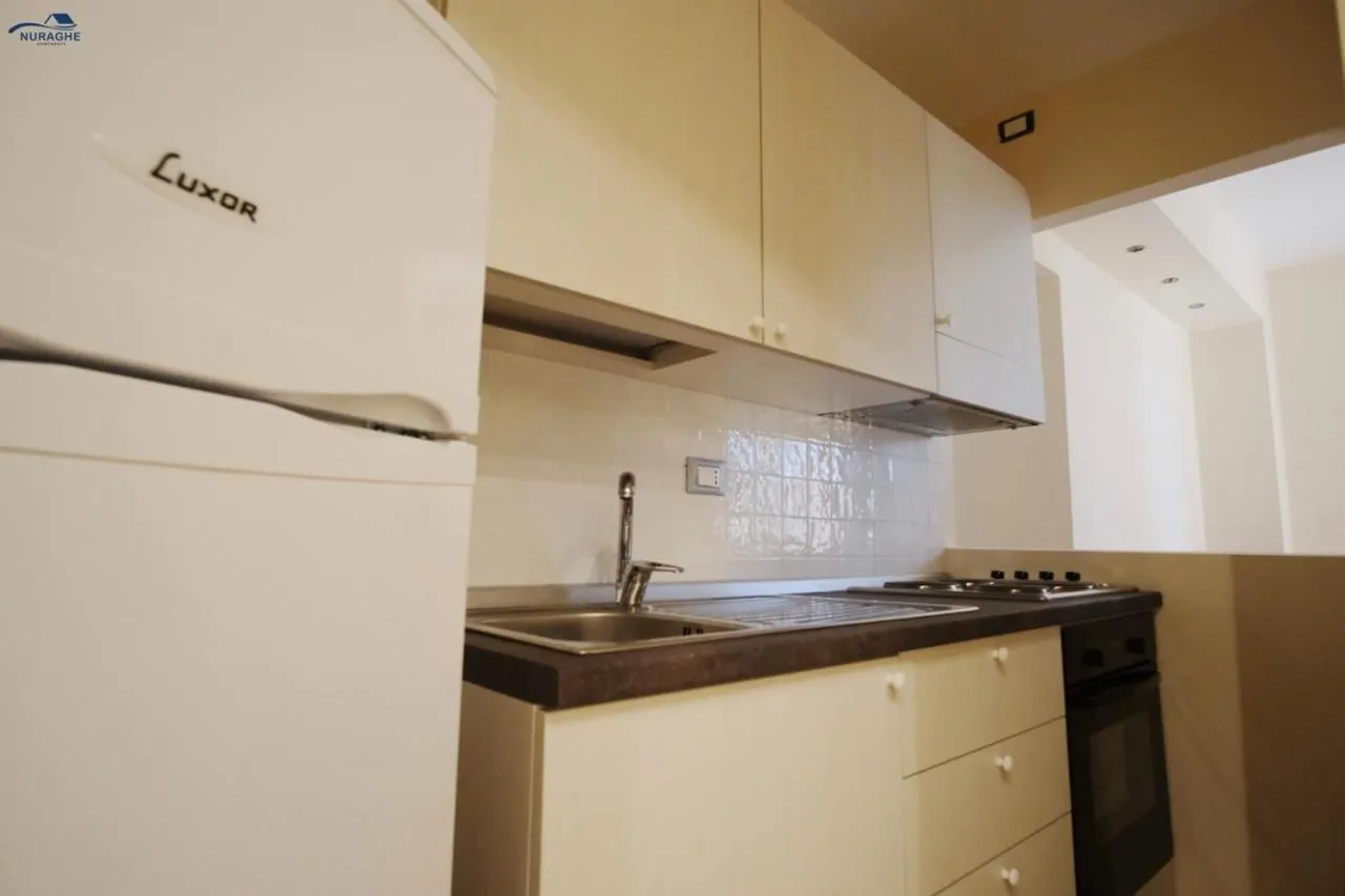 kitchen in Nuraghe Apartments