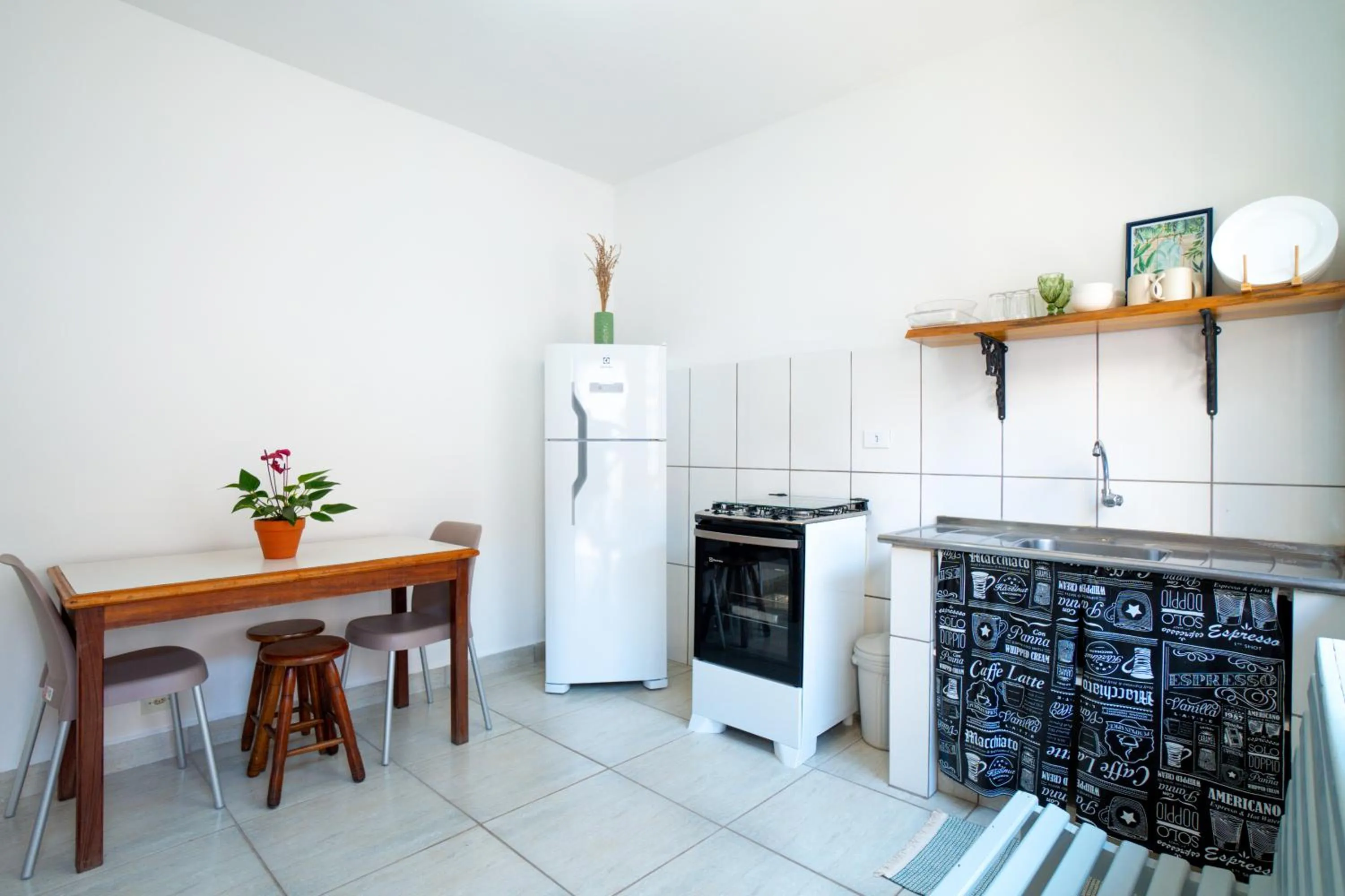 Kitchen or kitchenette in Chalés Canoas Ubatuba