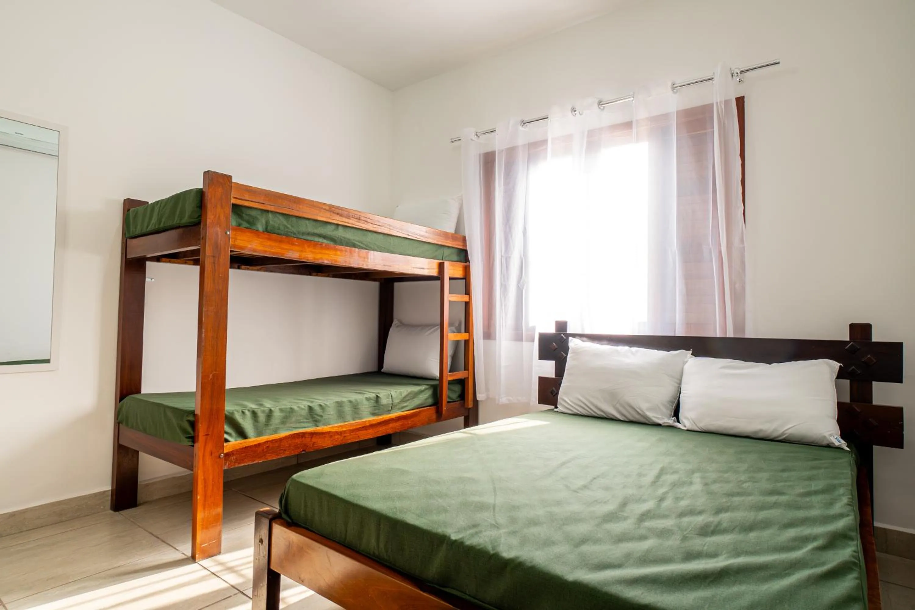 Bed in Chalés Canoas Ubatuba