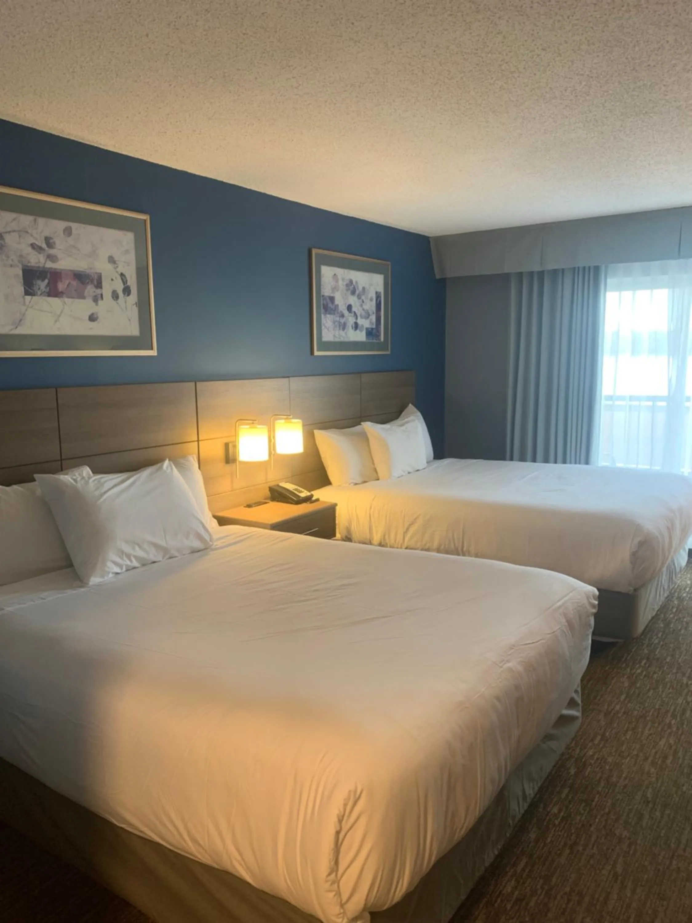 Bed in Anchor Inn and Suites