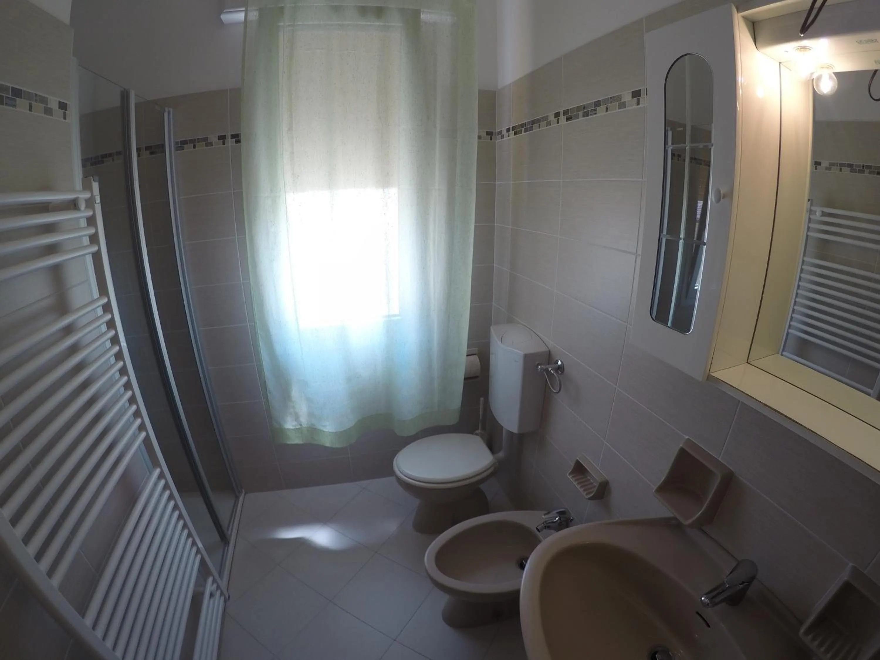 Bathroom in Residence Caorle Apartments - Agenzia Cocal