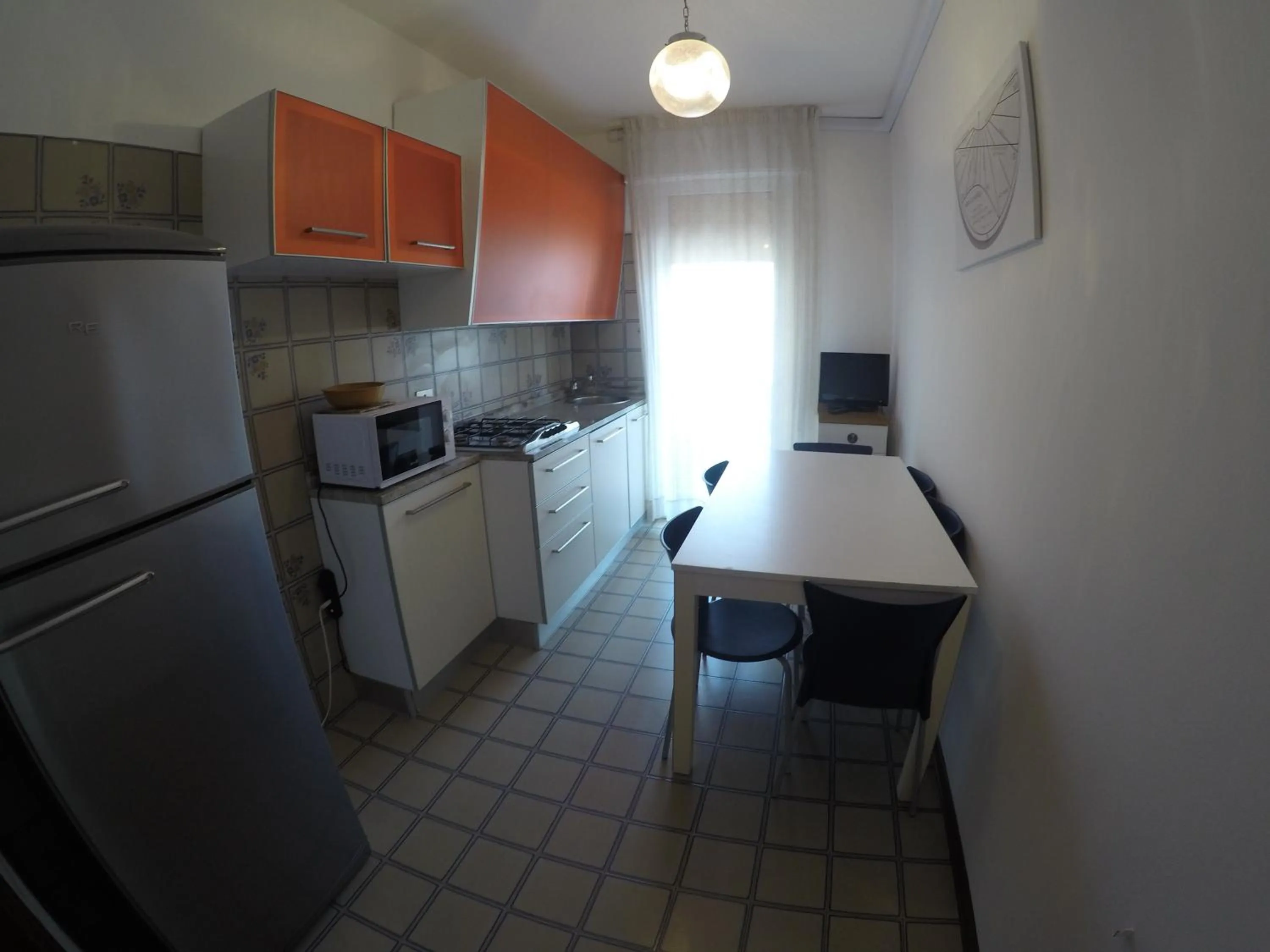 Kitchen or kitchenette in Residence Caorle Apartments - Agenzia Cocal