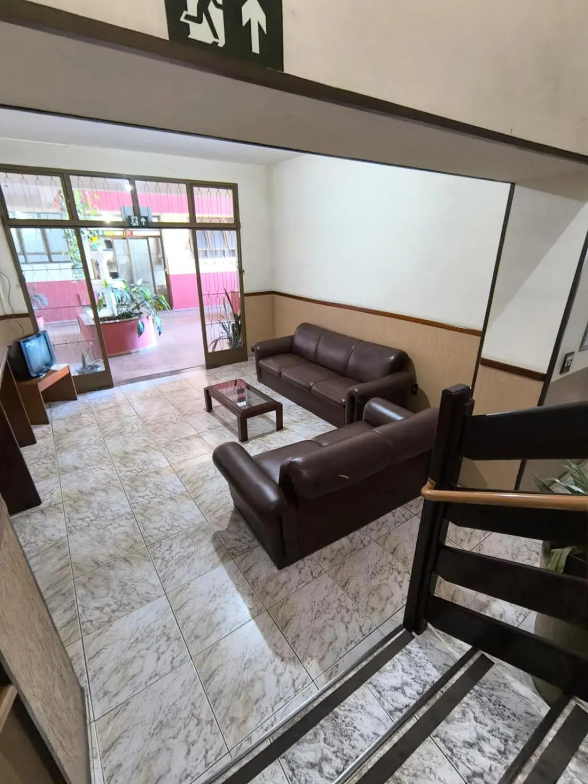 Communal lounge/ TV room in Hotel São Lucas