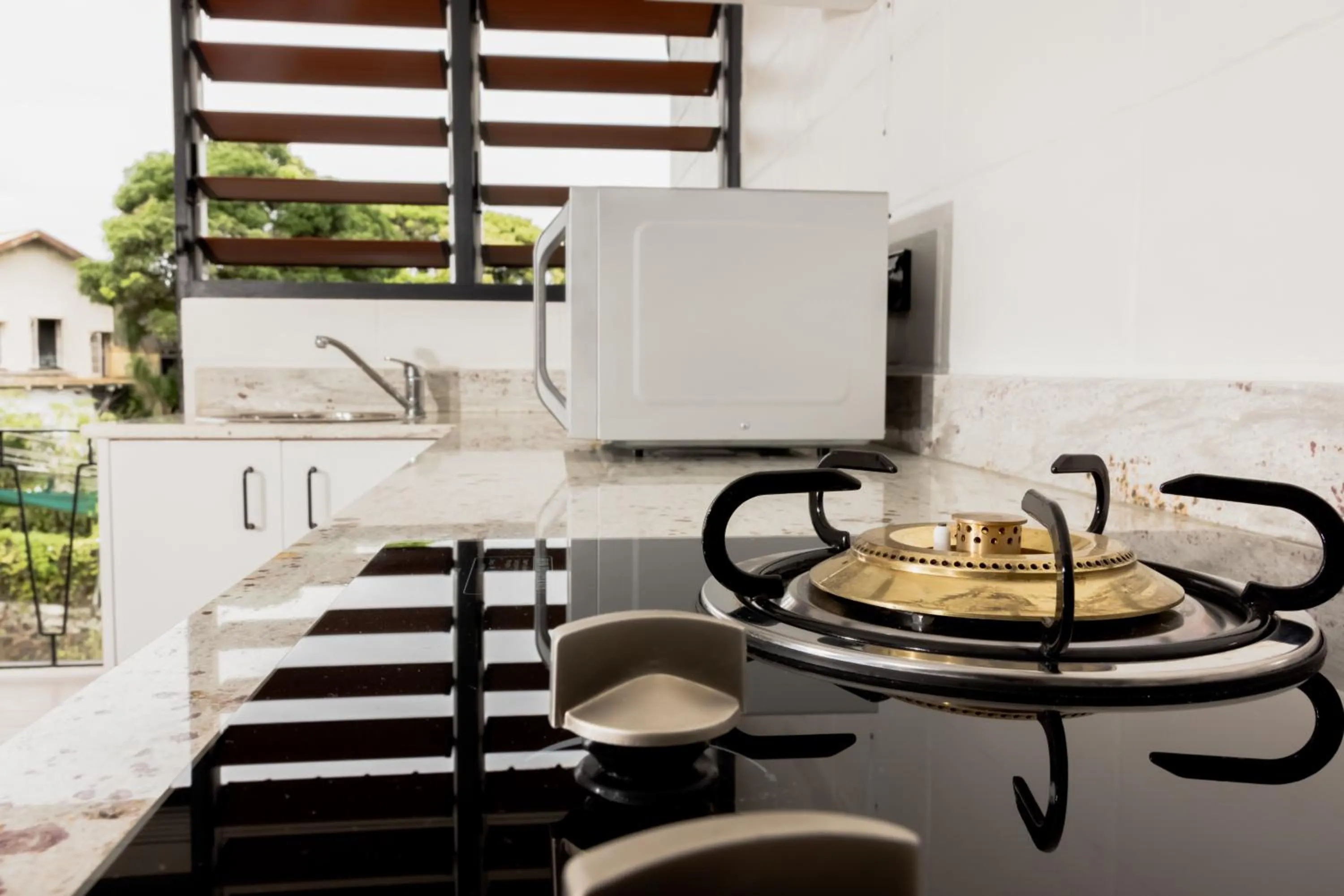 Kitchen or kitchenette in Capricorn Hotel Suva