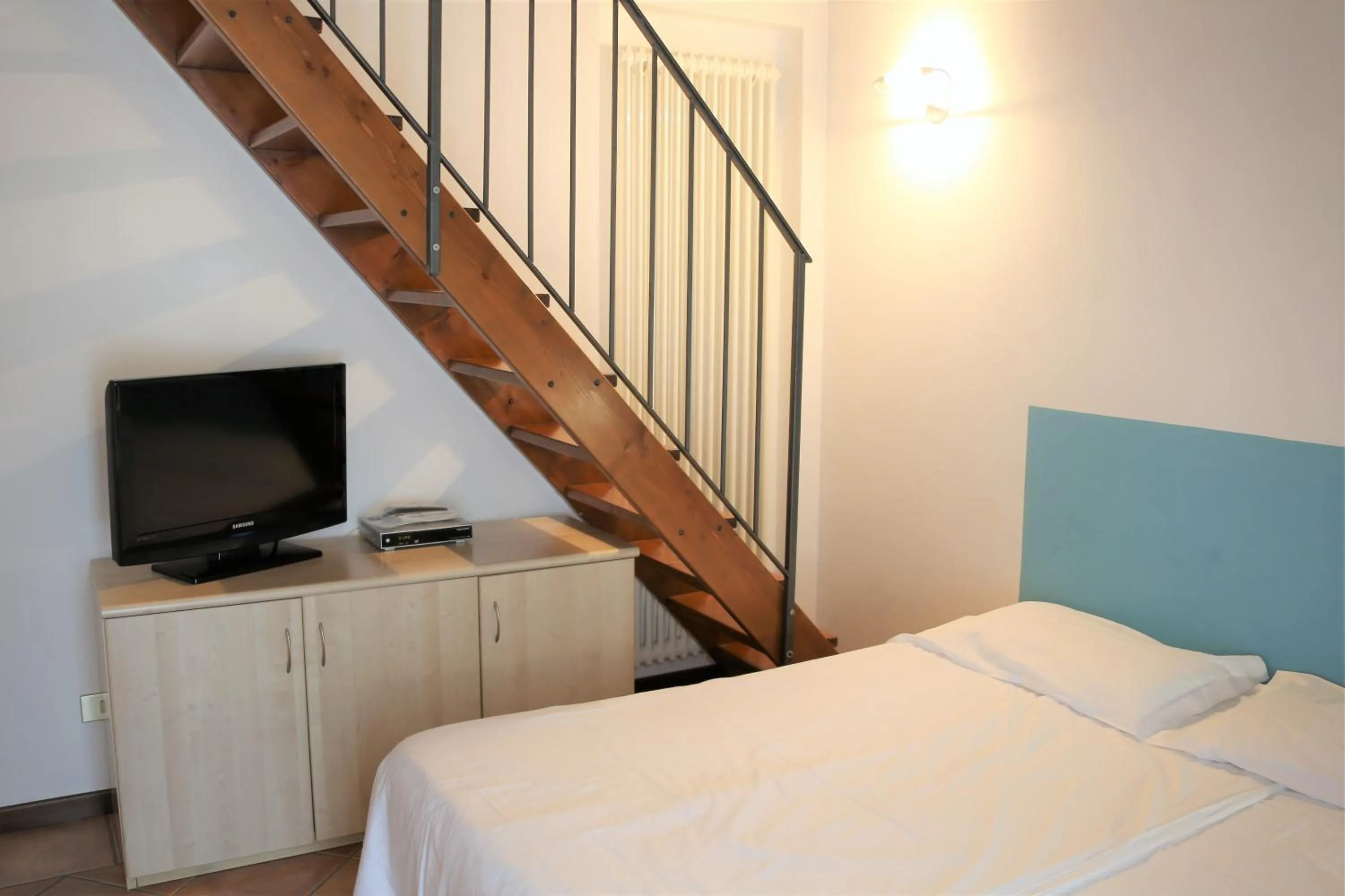 Bedroom, Bed in Appartamenti Ferrari Residence