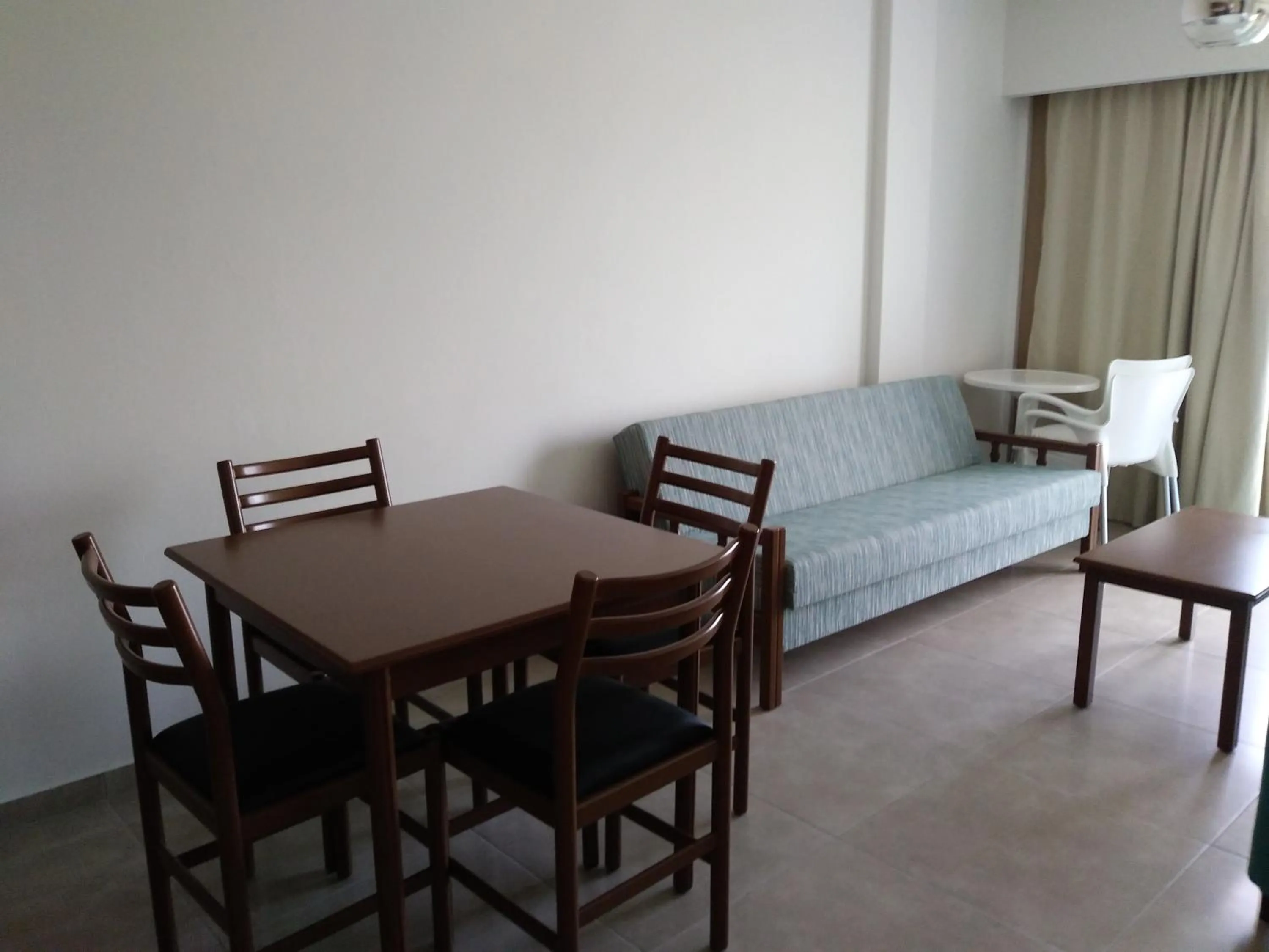 Seating area, Bed in Livas Hotel Apartments