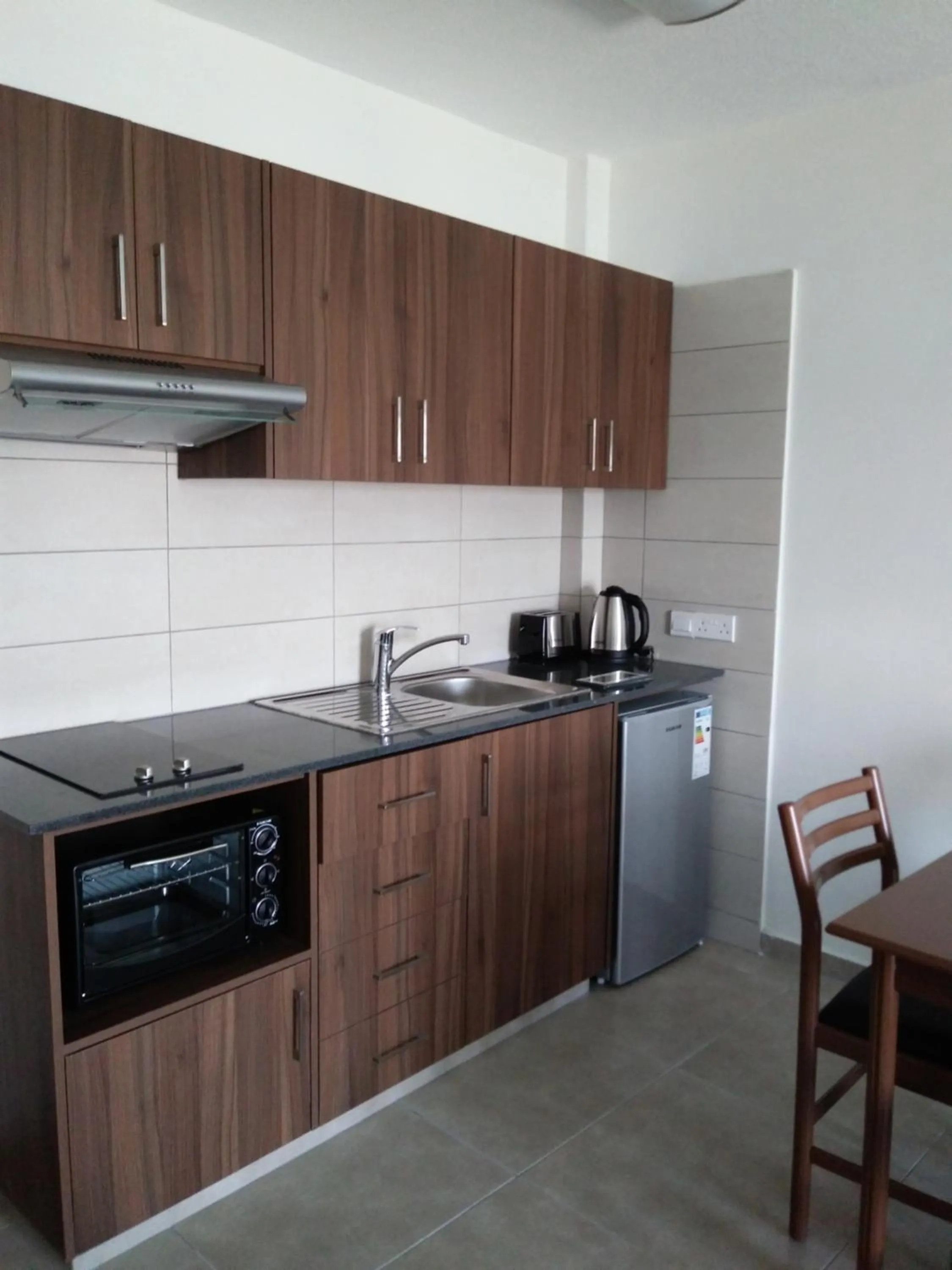 Kitchen or kitchenette in Livas Hotel Apartments