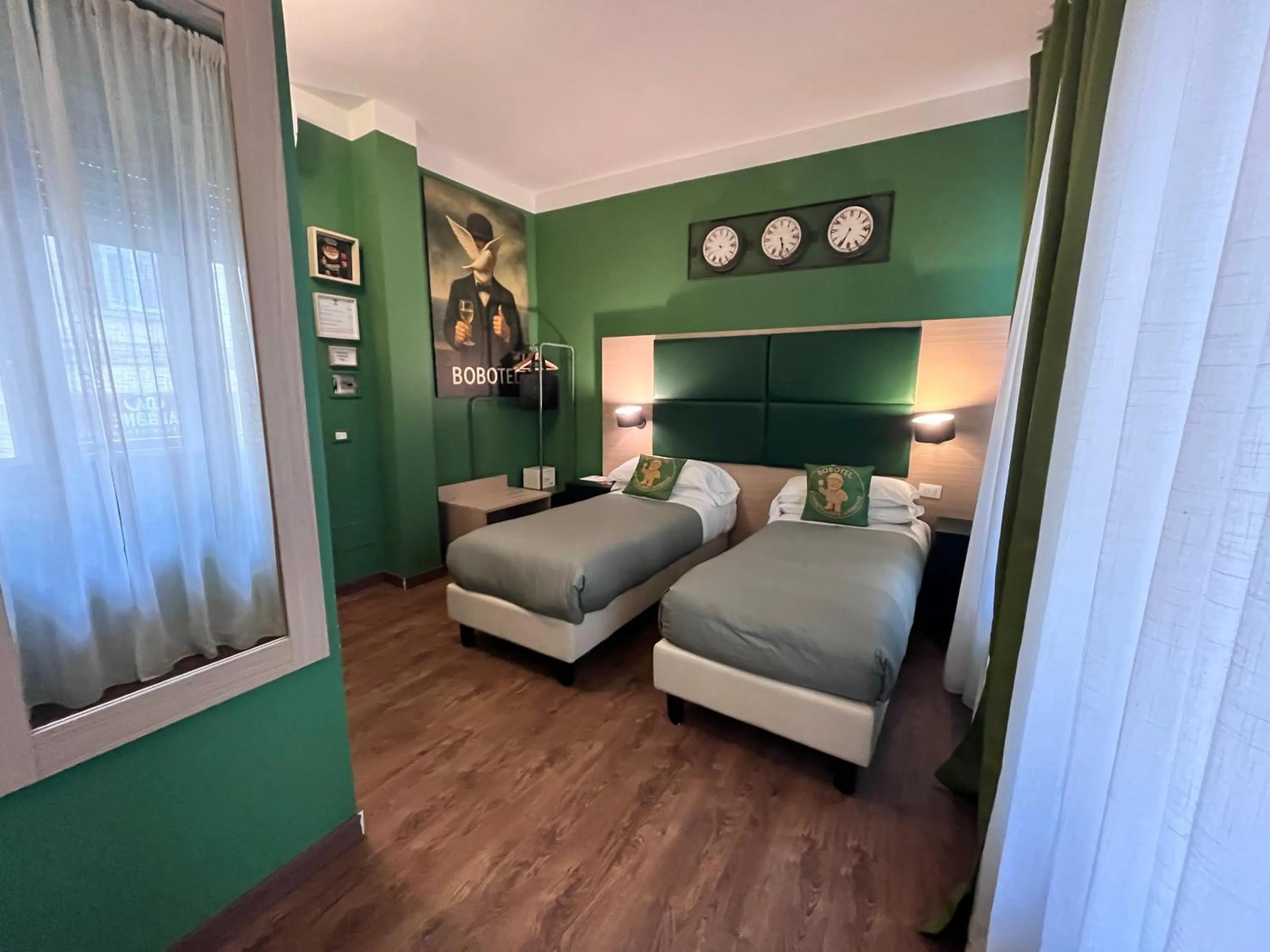 Photo of the whole room, Bed in BOBOTEL Rooms in City Center