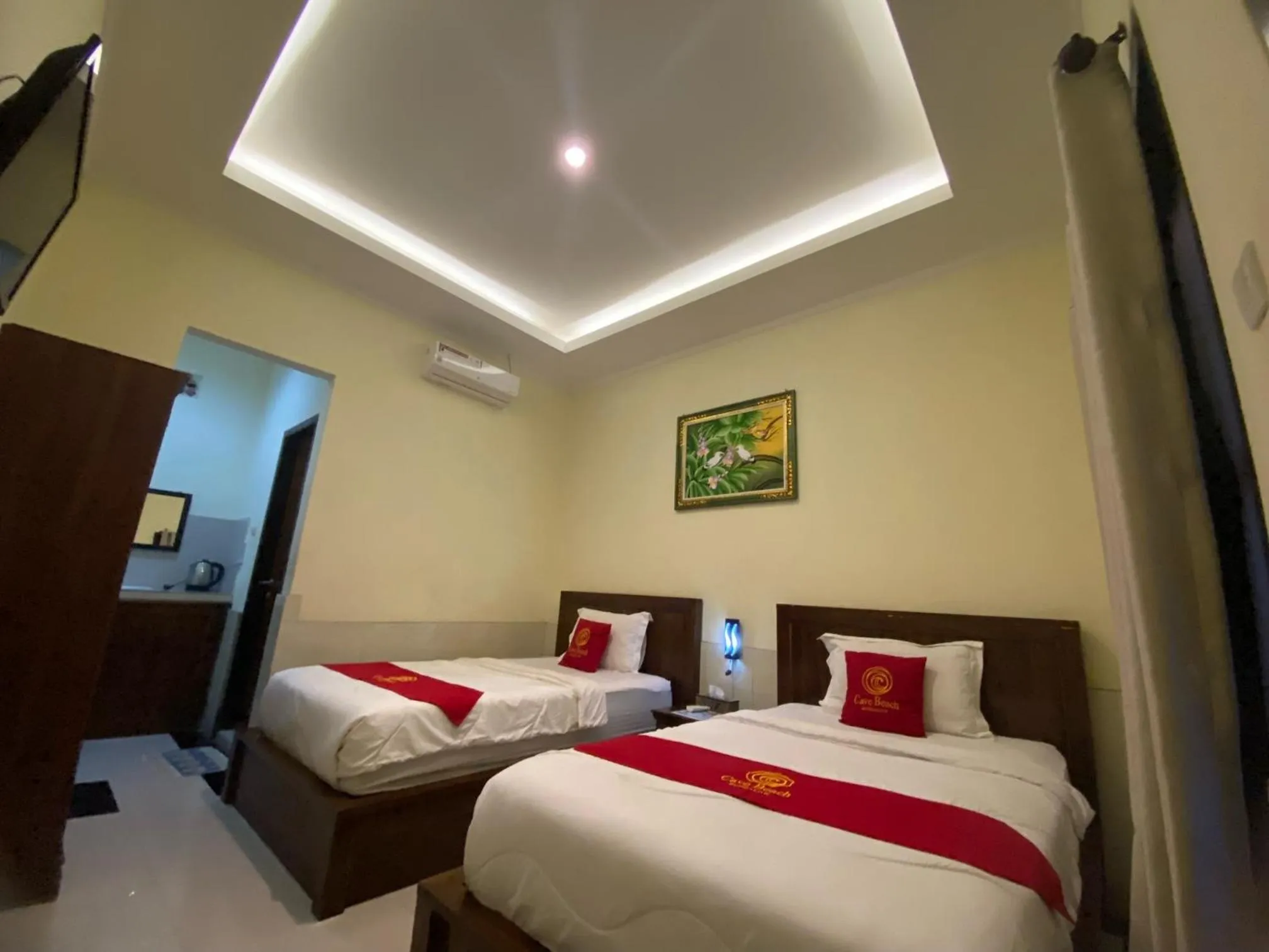 Bed in Cave Beach Bungalow