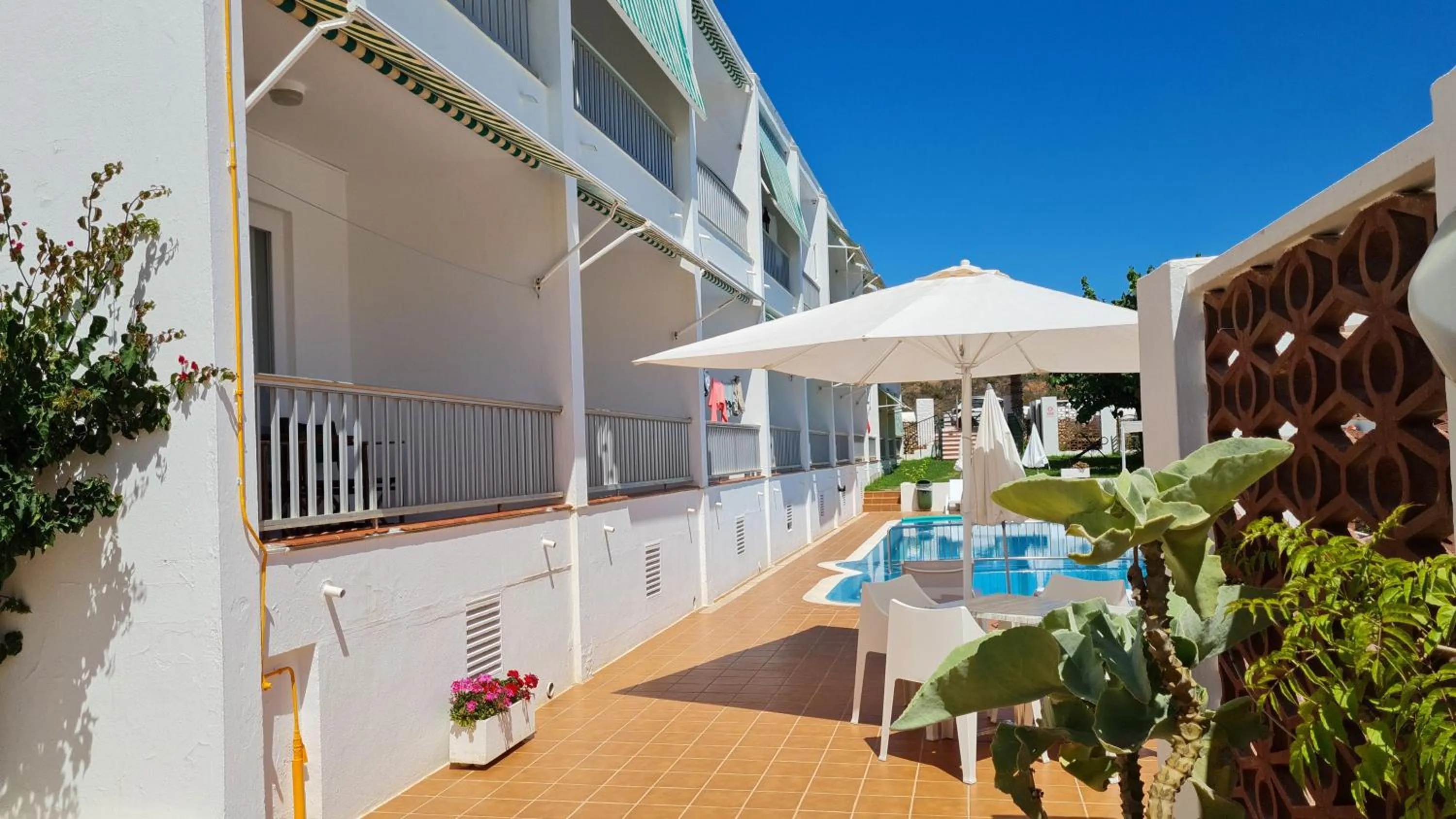 Swimming pool in Hostal S'Algaret