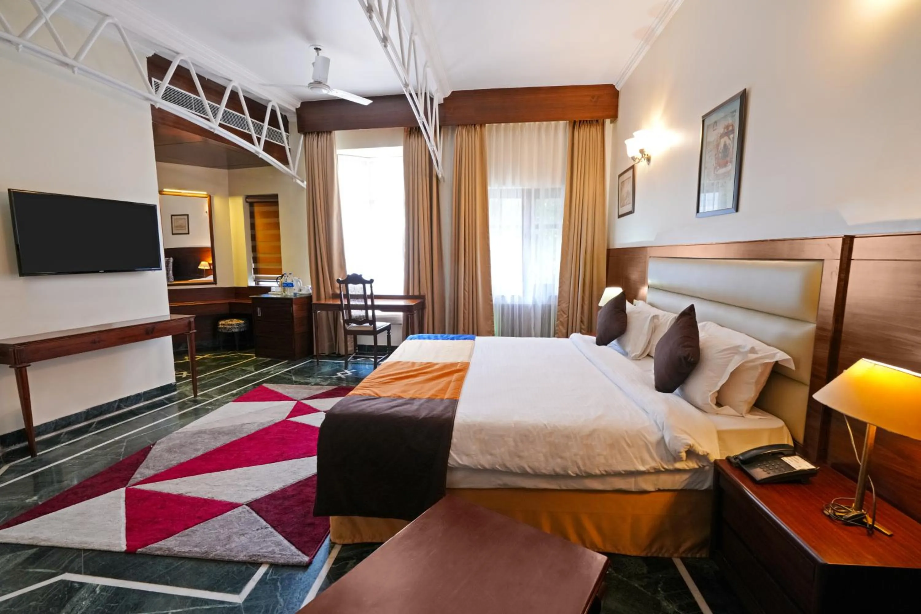 Bed in WelcomHeritage Taragarh Palace