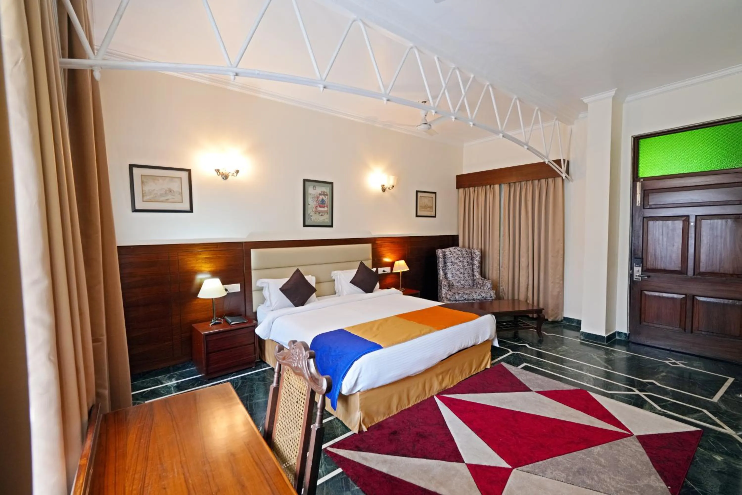 Bed in WelcomHeritage Taragarh Palace