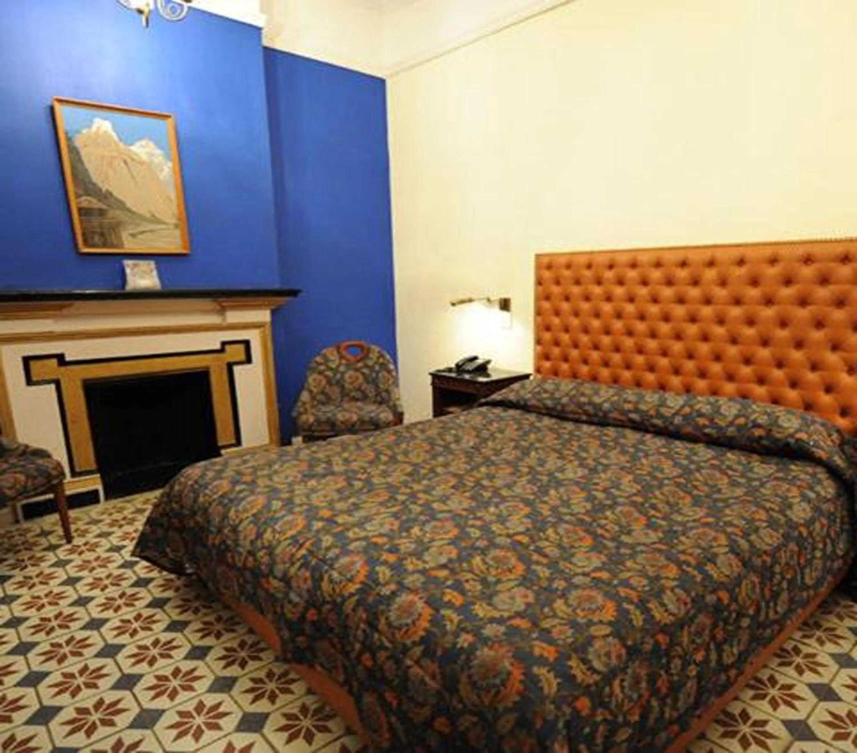 Bed in WelcomHeritage Taragarh Palace