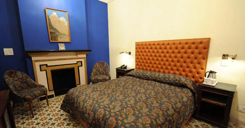 Bed in WelcomHeritage Taragarh Palace