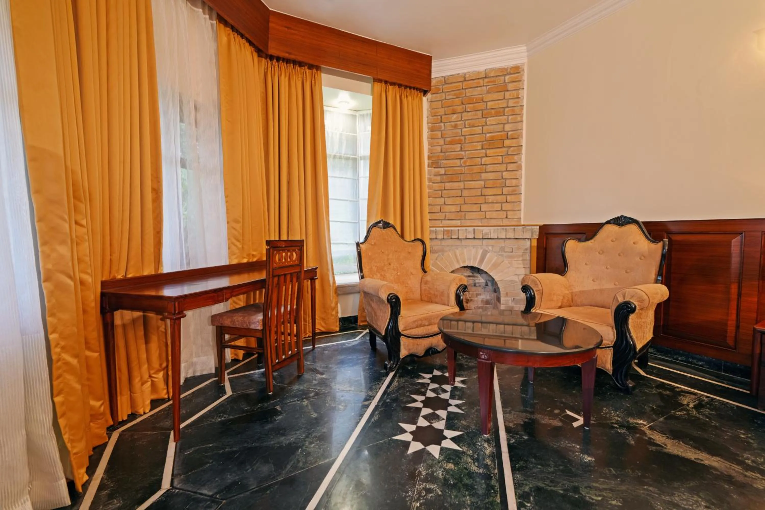 Seating area in WelcomHeritage Taragarh Palace